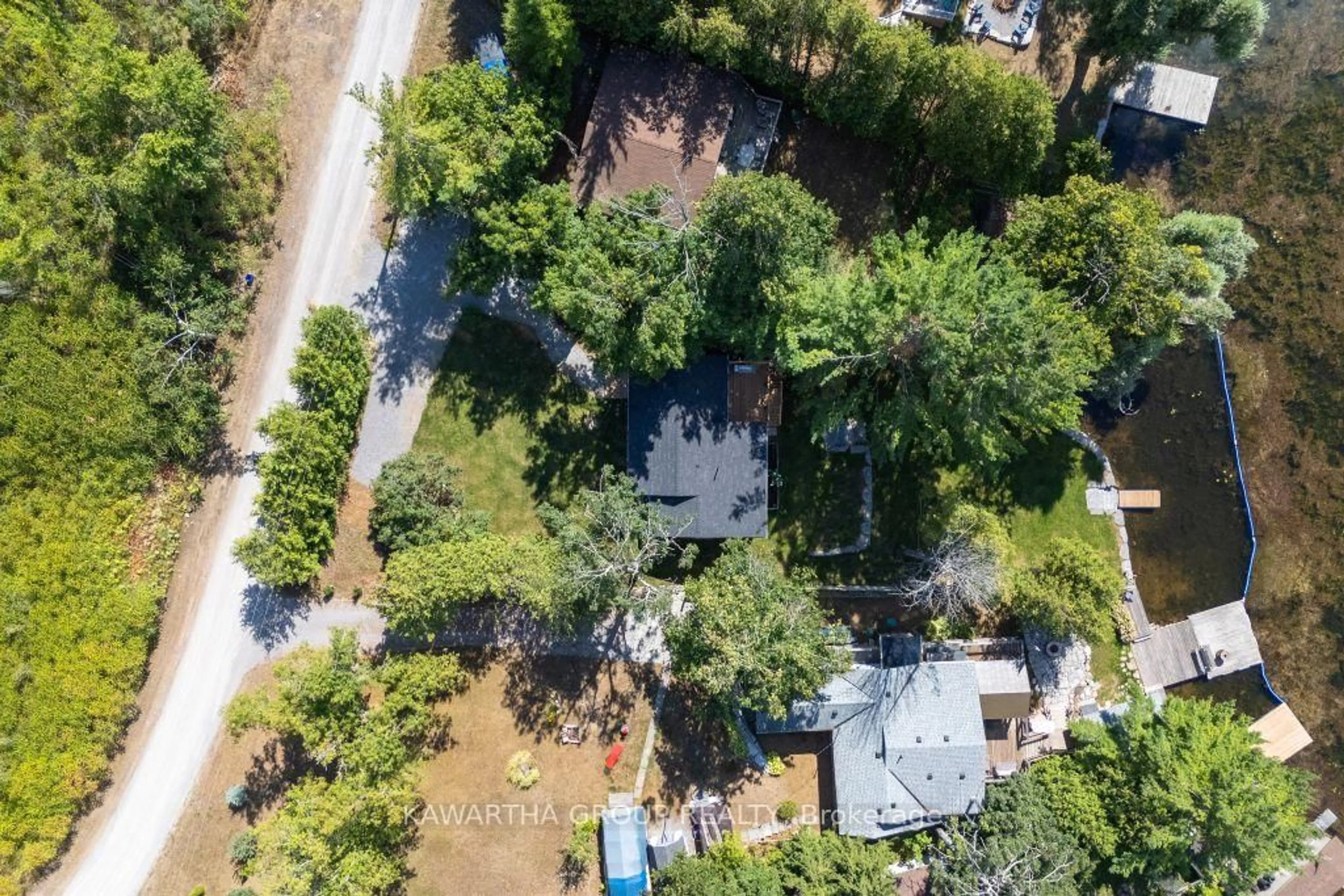 A pic from outside/outdoor area/front of a property/back of a property/a pic from drone, street for 77 North Taylor Rd, Kawartha Lakes Ontario K0M 2B0