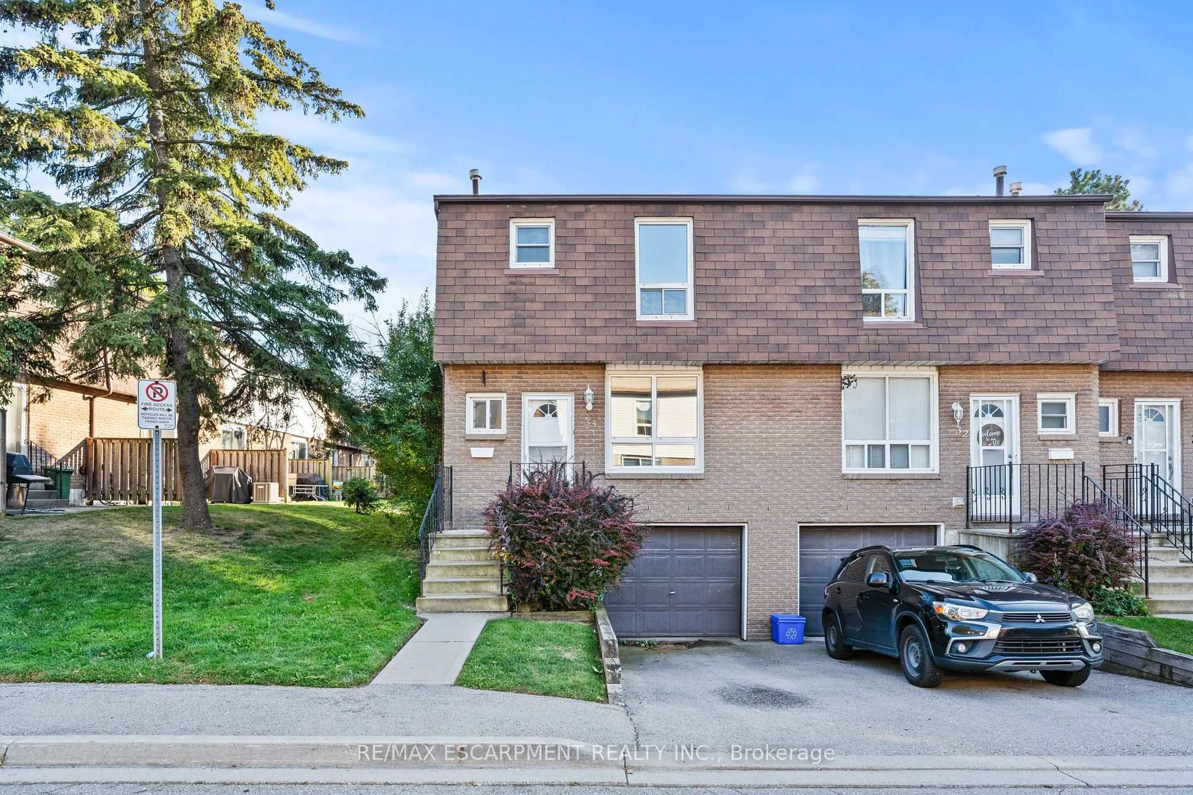 Home with brick exterior material, street for 1301 Upper Gage Ave #33, Hamilton Ontario L8W 1E5