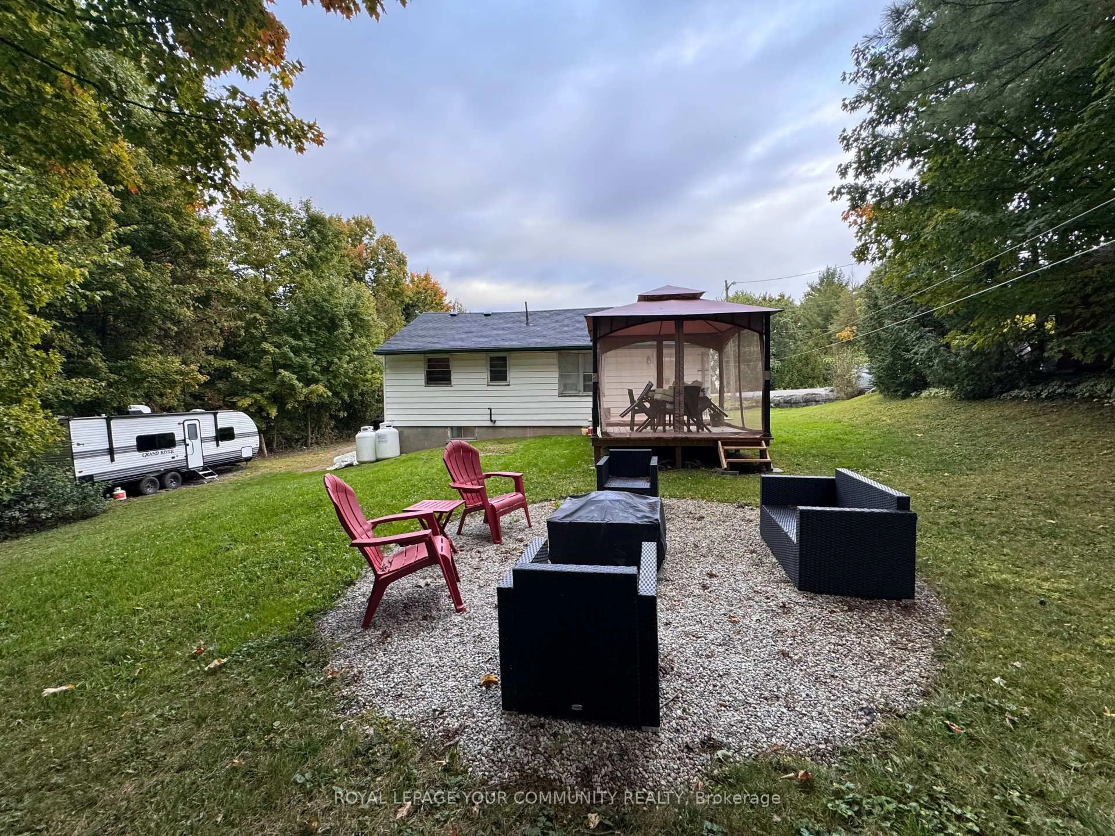 A pic from outside/outdoor area/front of a property/back of a property/a pic from drone, unknown for 535 County Rd 121 Rd, Kawartha Lakes Ontario K0M 1N0
