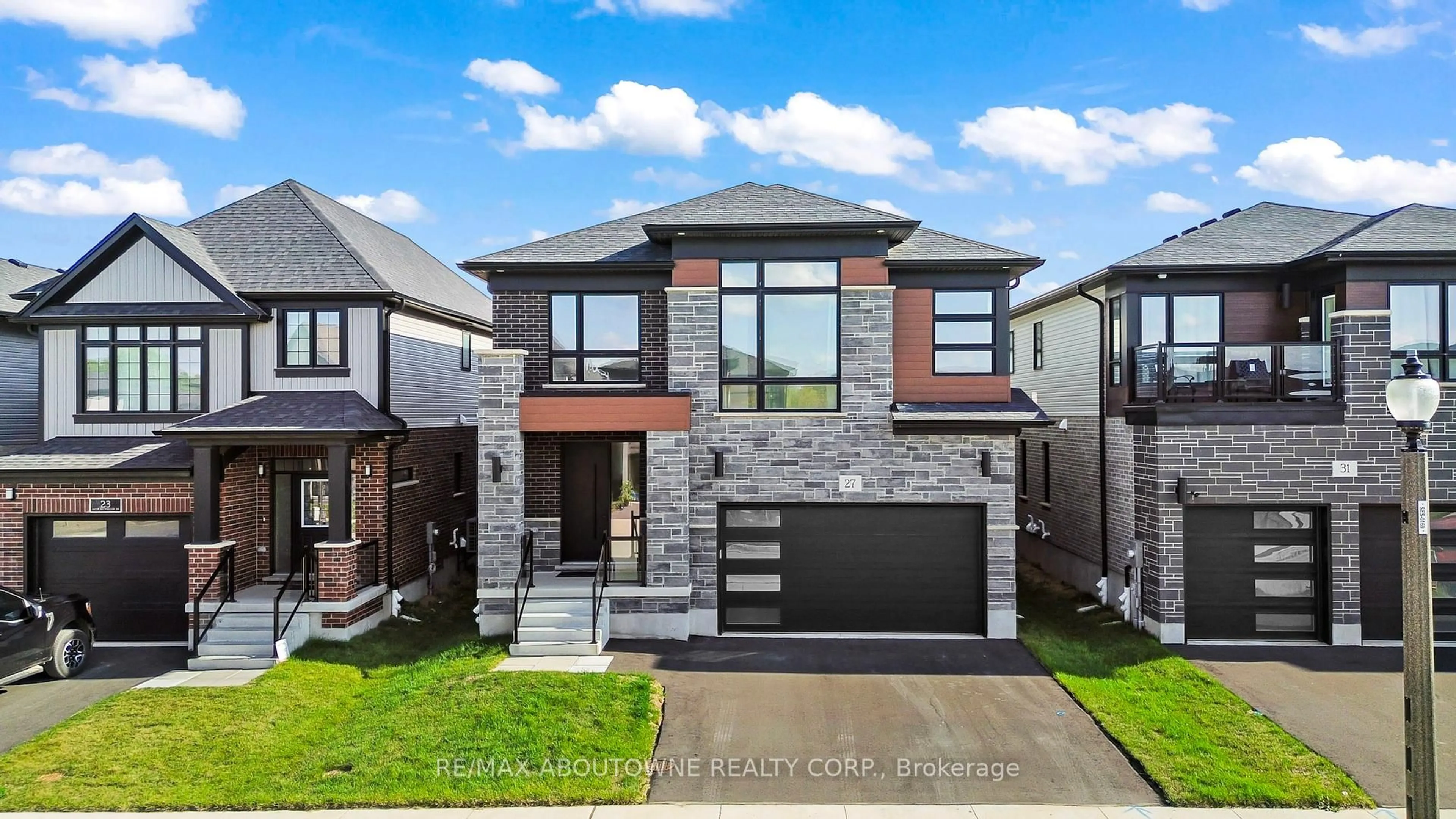 Home with brick exterior material, street for 27 Jacob Detweiller Dr, Kitchener Ontario N2P 0K7