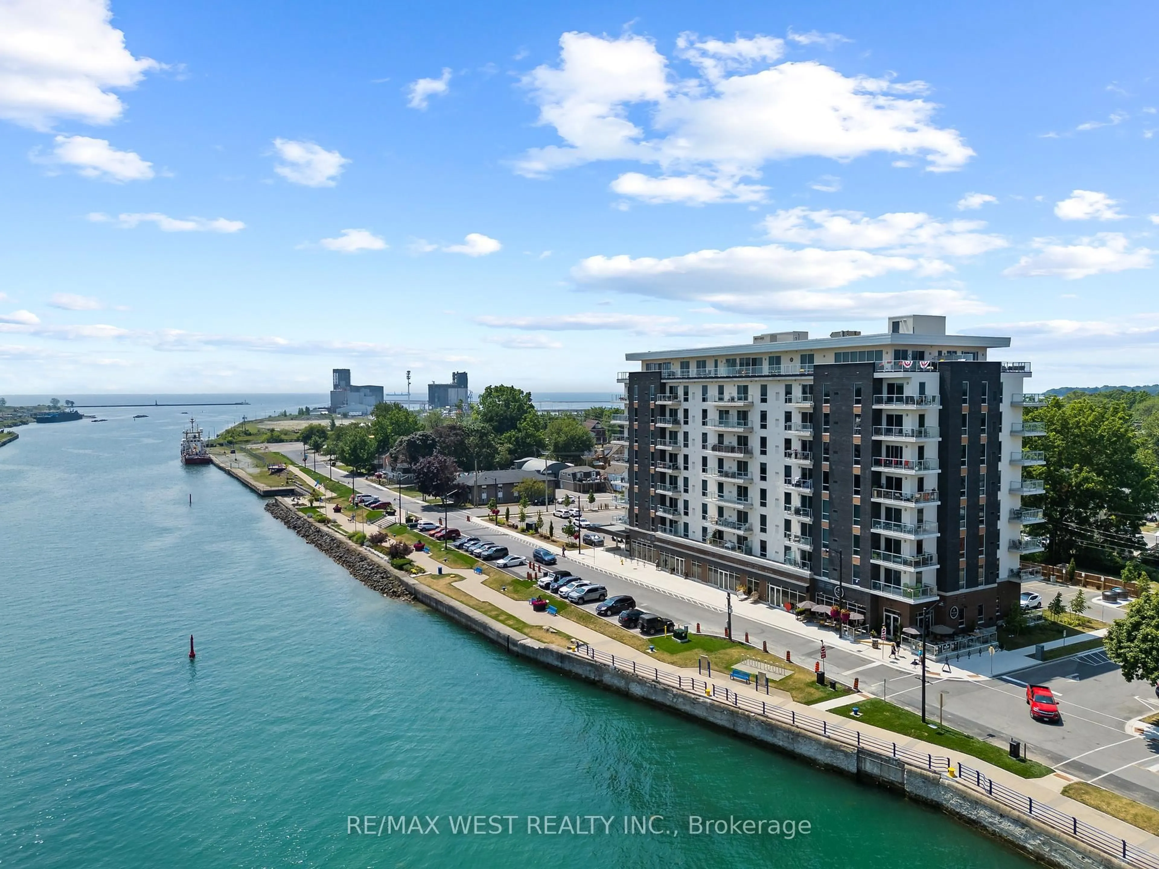 A pic from outside/outdoor area/front of a property/back of a property/a pic from drone, water/lake/river/ocean view for 118 West St #502, Port Colborne Ontario L3K 4C9