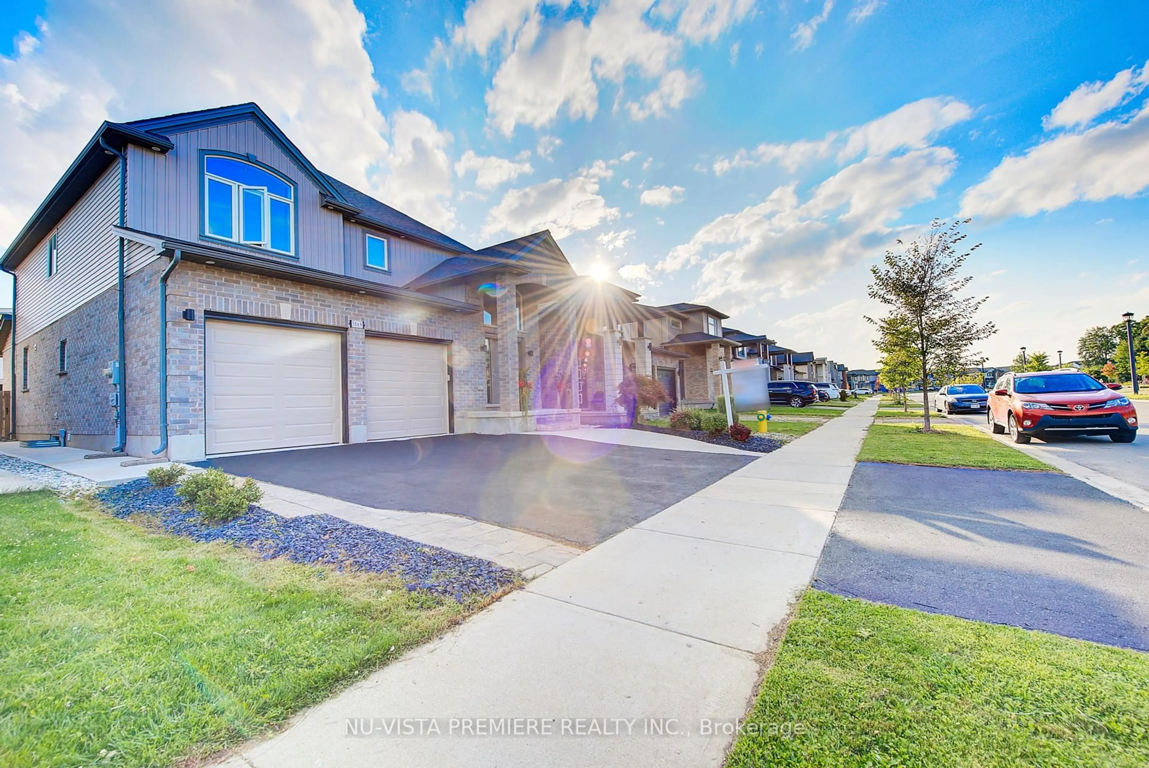 A pic from outside/outdoor area/front of a property/back of a property/a pic from drone, street for 3069 TOKALA Tr, London North Ontario N6G 0S7