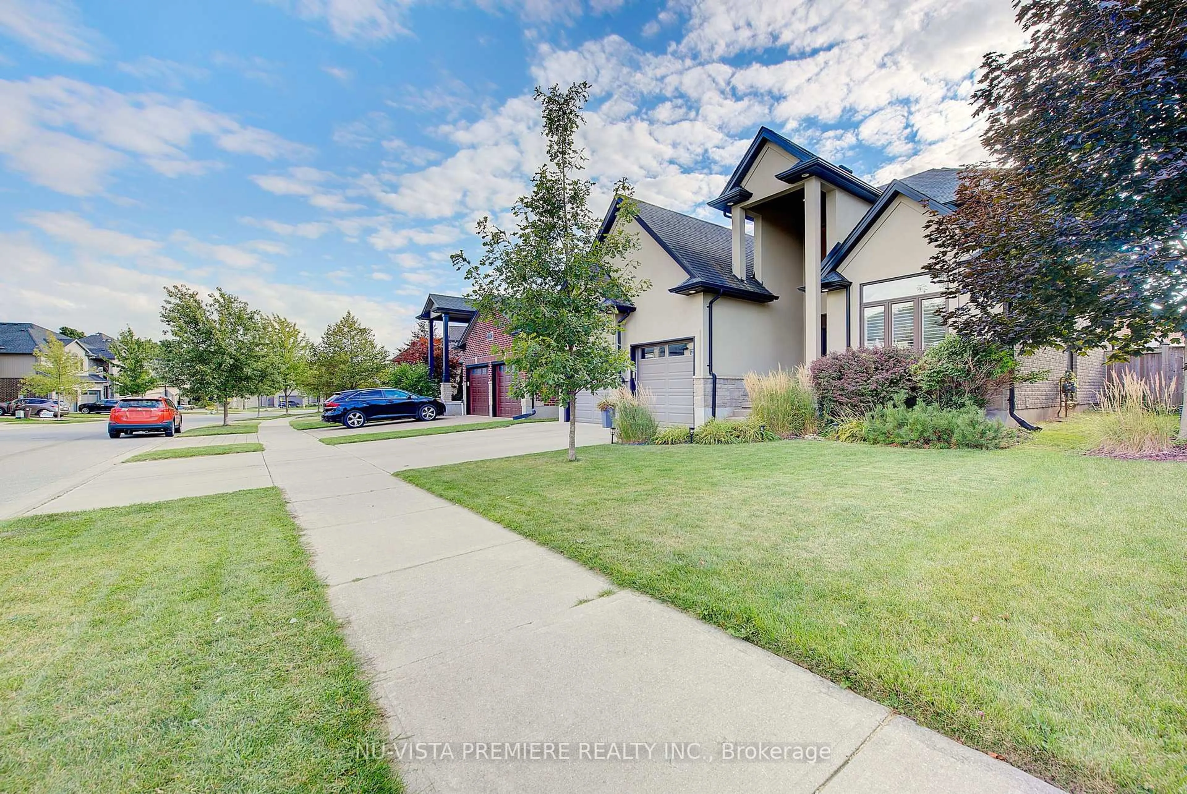 A pic from outside/outdoor area/front of a property/back of a property/a pic from drone, street for 3209 Tillmann Rd, London South Ontario N6P 0C2