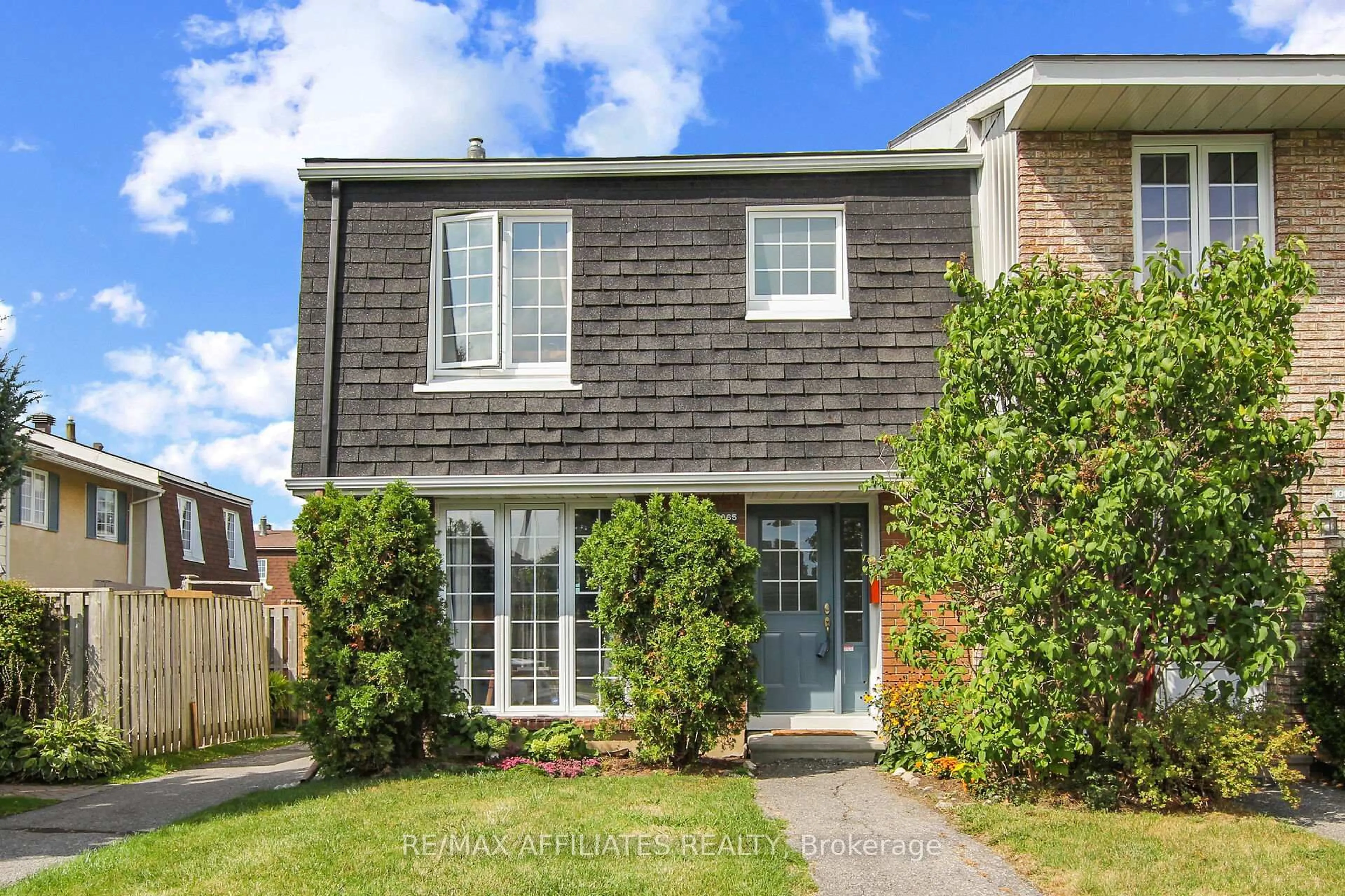 Home with brick exterior material, street for 1065 Meadowlands Dr, Ottawa Ontario K2C 0K5