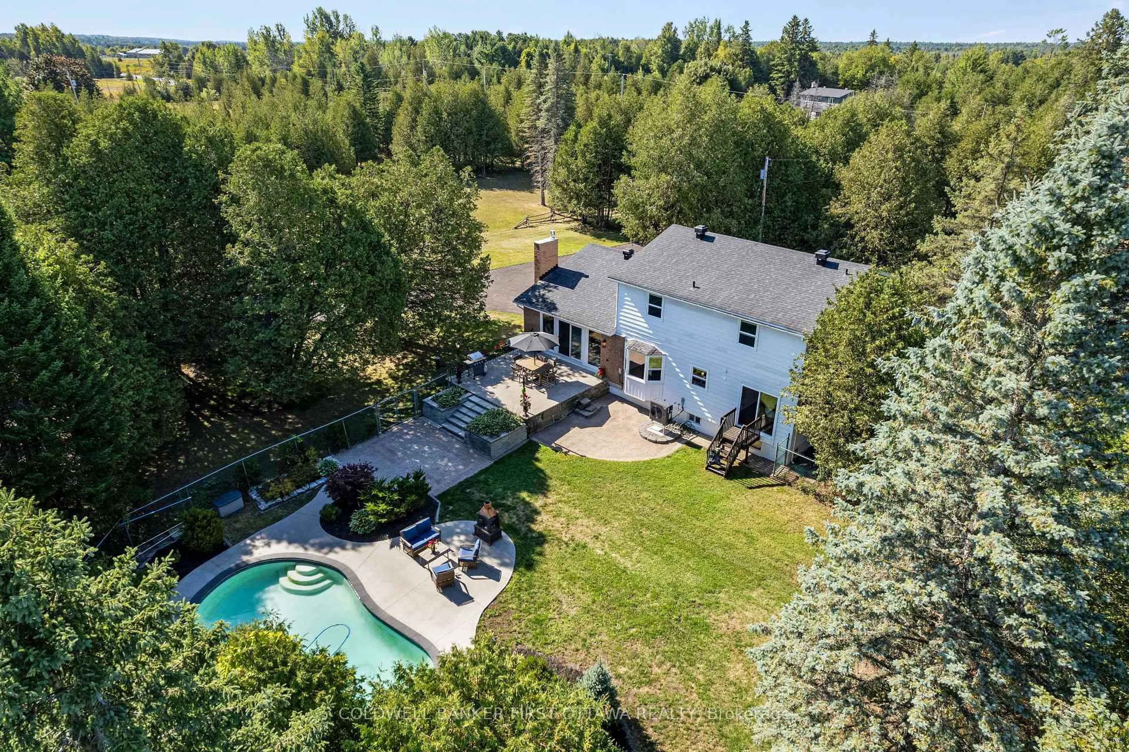 A pic from outside/outdoor area/front of a property/back of a property/a pic from drone, water/lake/river/ocean view for 1390 Corkery Rd, Carp Ontario K0A 1L0
