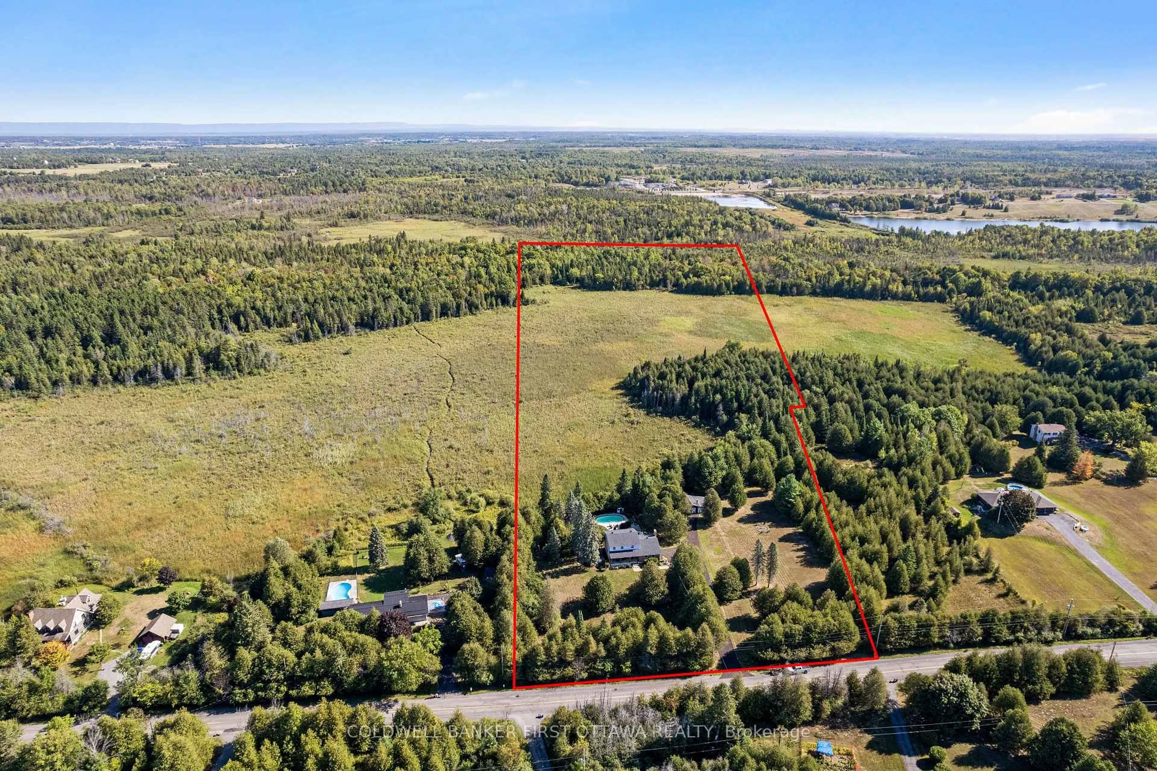 A pic from outside/outdoor area/front of a property/back of a property/a pic from drone, forest/trees view for 1390 Corkery Rd, Carp Ontario K0A 1L0
