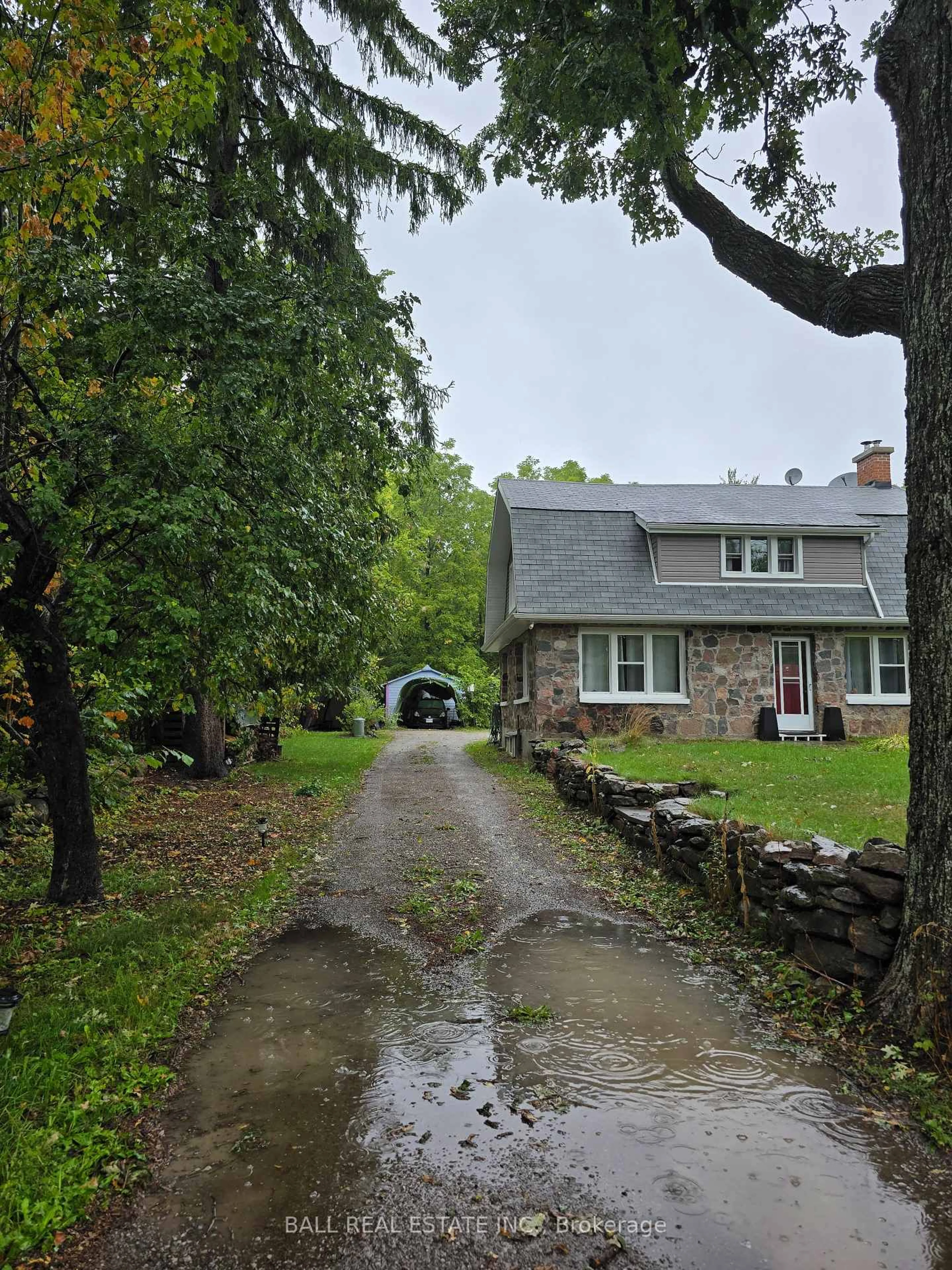 A pic from outside/outdoor area/front of a property/back of a property/a pic from drone, street for 2056 Young's Point Rd, Selwyn Ontario K0L 2H0
