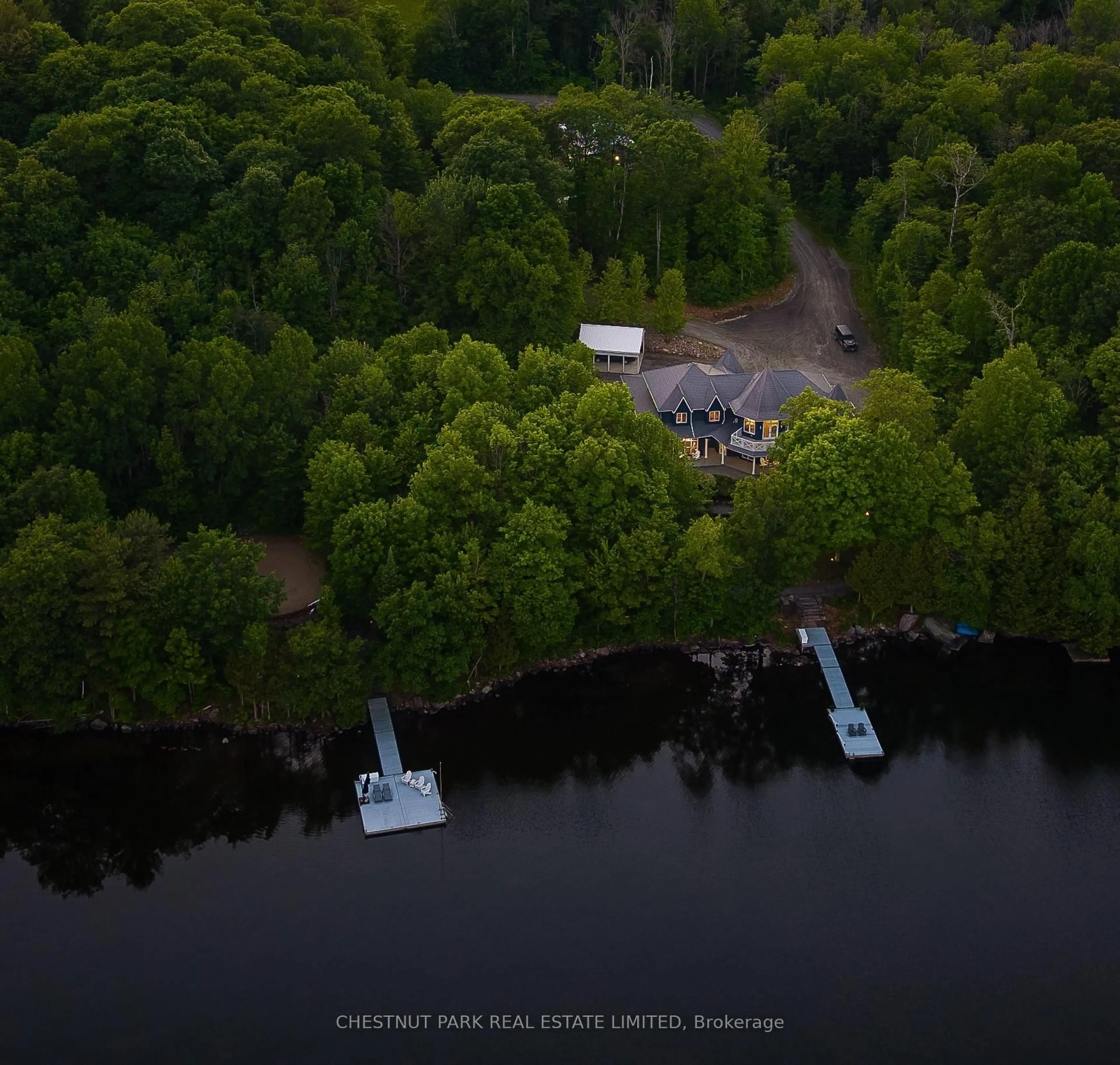 A pic from outside/outdoor area/front of a property/back of a property/a pic from drone, water/lake/river/ocean view for 1141 Nu-Ne Lane, Algonquin Highlands Ontario K0M 1S0