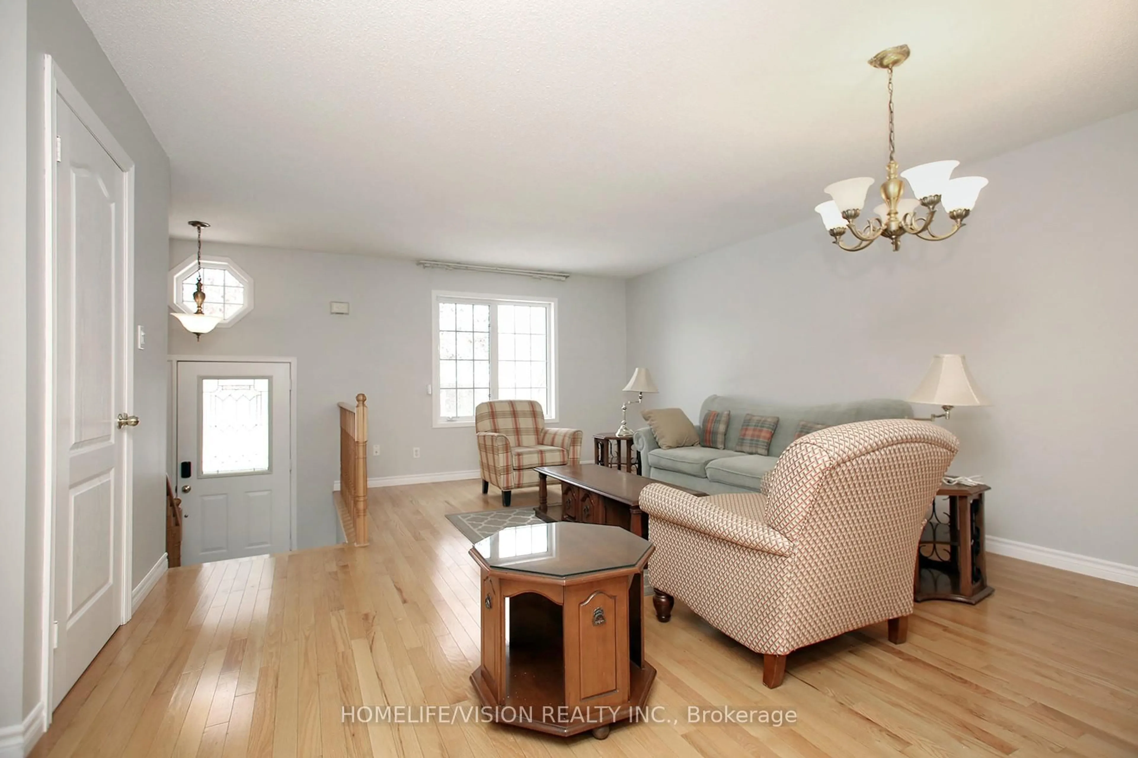 Living room with furniture, wood/laminate floor for 1105 Tillison Ave, Cobourg Ontario K9A 5N4