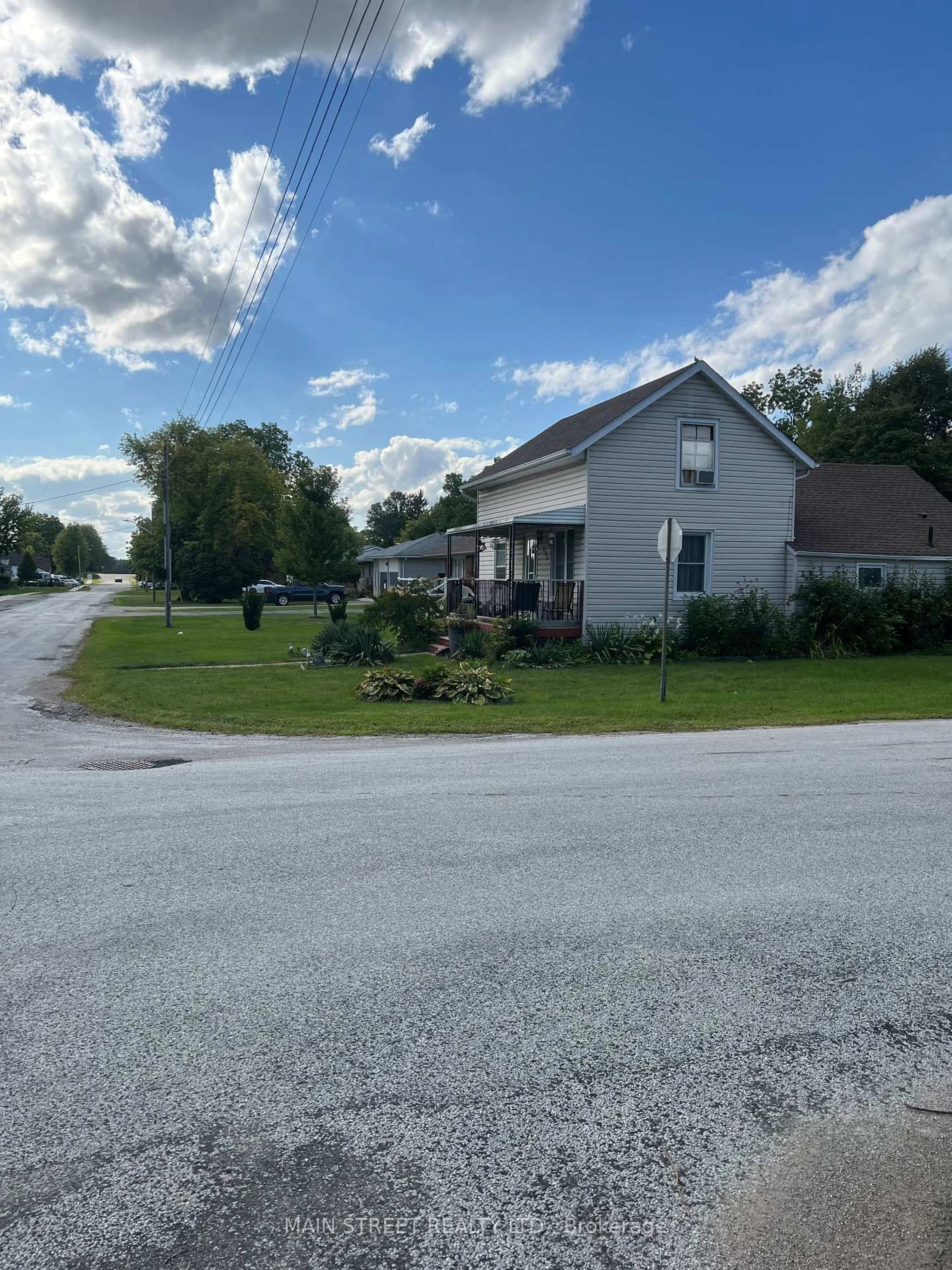 A pic from outside/outdoor area/front of a property/back of a property/a pic from drone, street for 523 Sarnia St, Plympton-Wyoming Ontario N0N 1T0