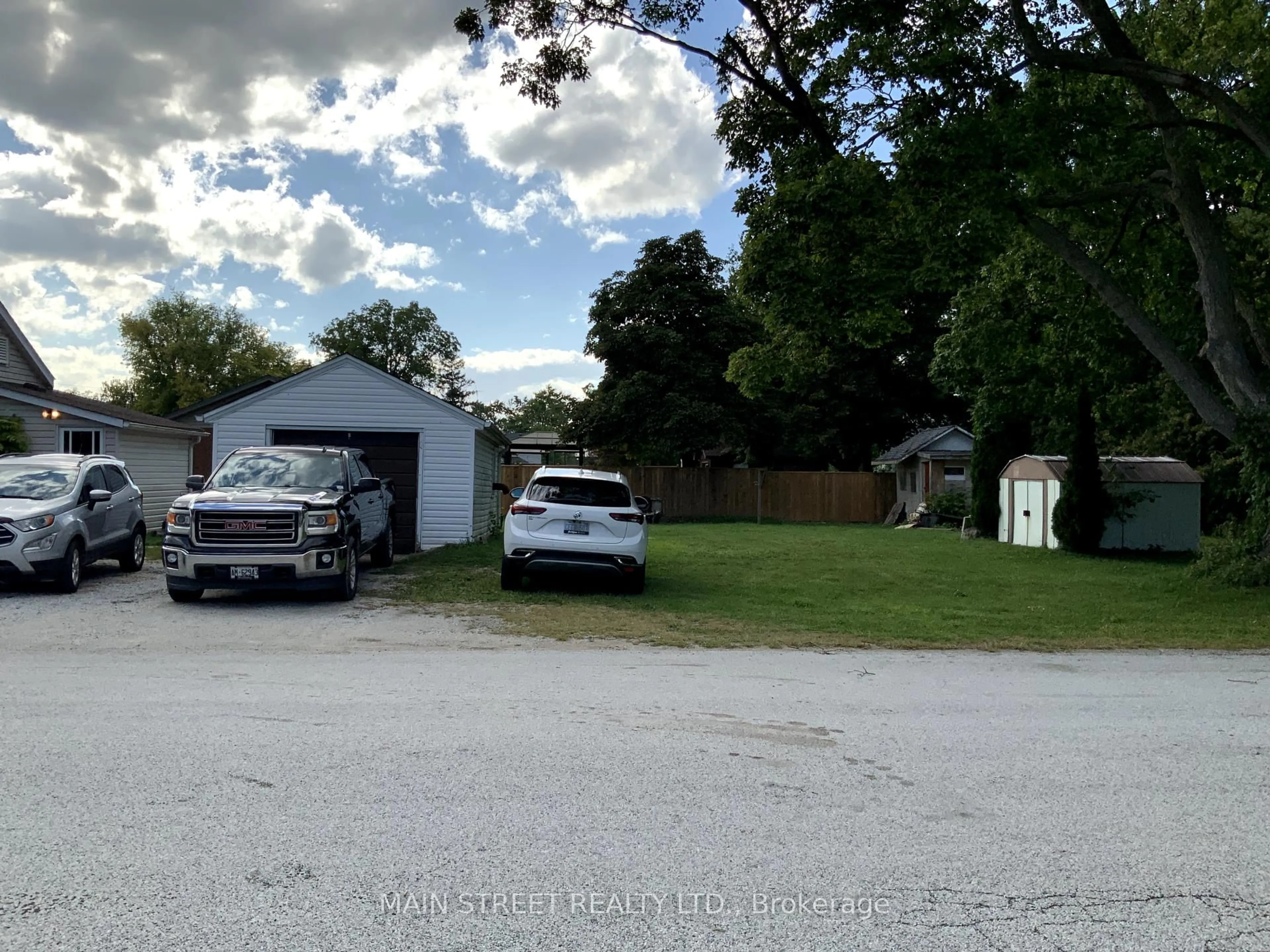 A pic from outside/outdoor area/front of a property/back of a property/a pic from drone, street for 523 Sarnia St, Plympton-Wyoming Ontario N0N 1T0