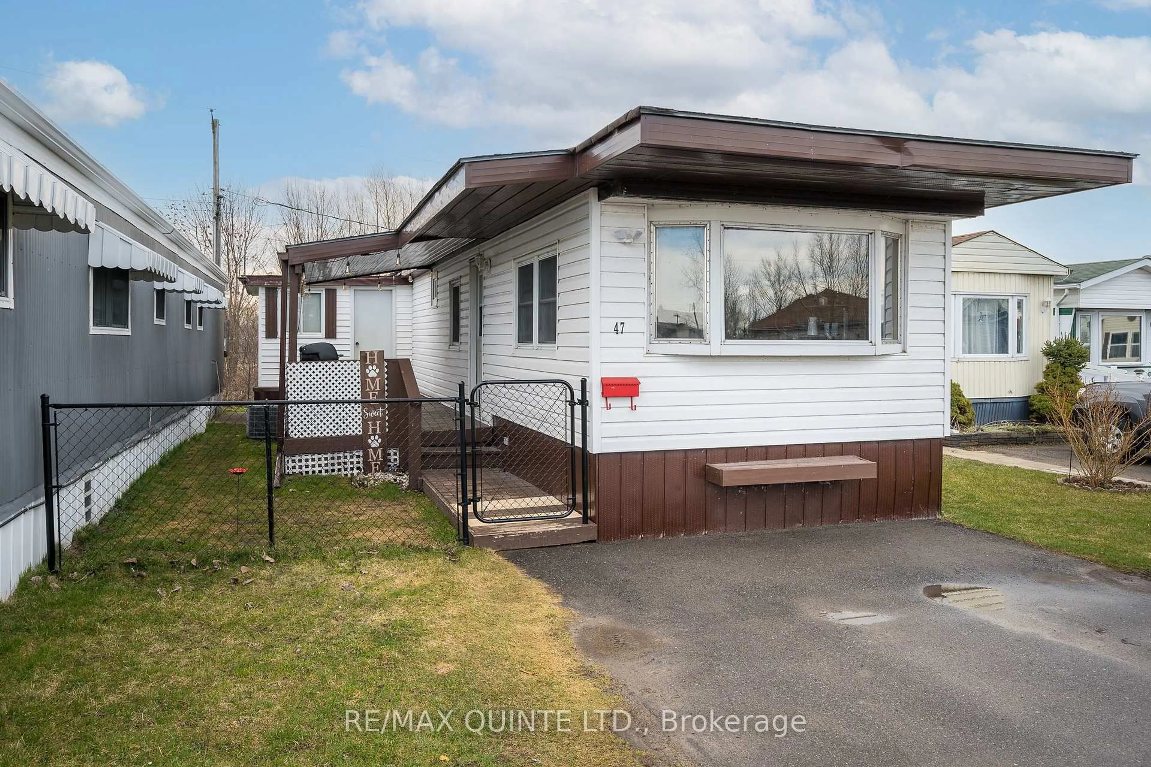 Home with vinyl exterior material, street for 311 Dundas St #47, Quinte West Ontario K8V 3E5
