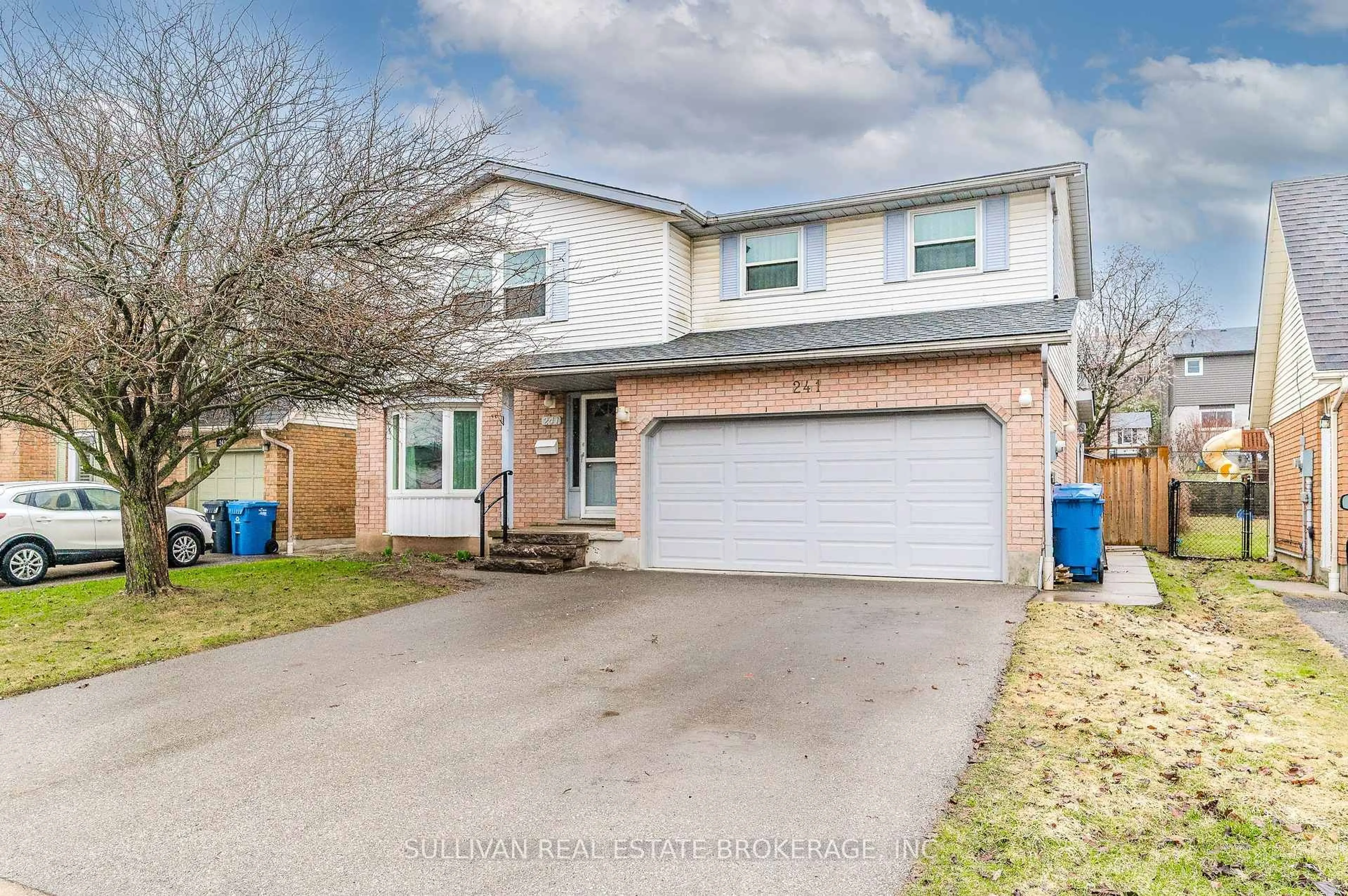 Home with vinyl exterior material, street for 241 Elmira Rd, Guelph Ontario N1K 1R1
