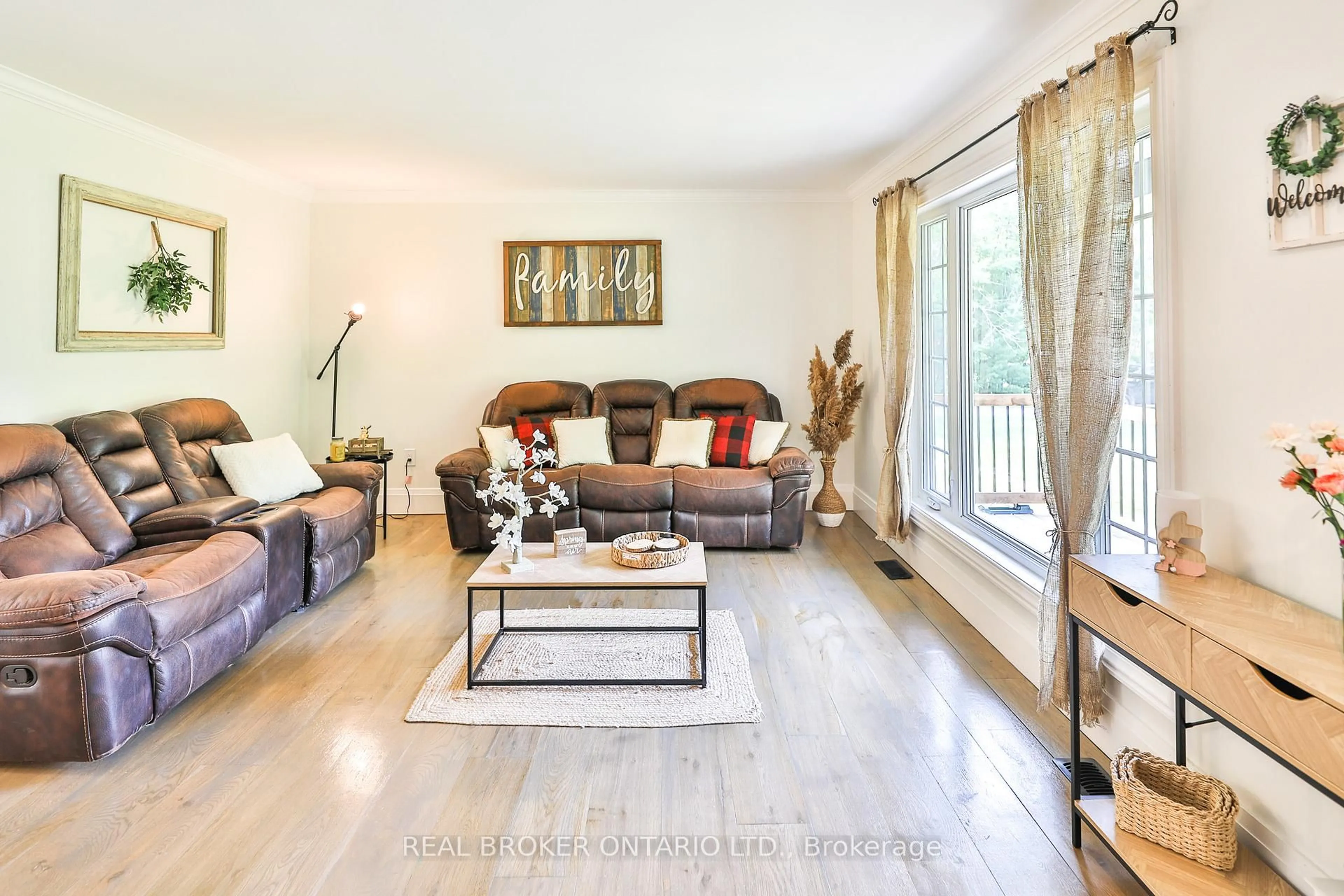 Living room with furniture, wood/laminate floor for 8 Benjamin Lane, North Grenville Ontario K0G 1J0