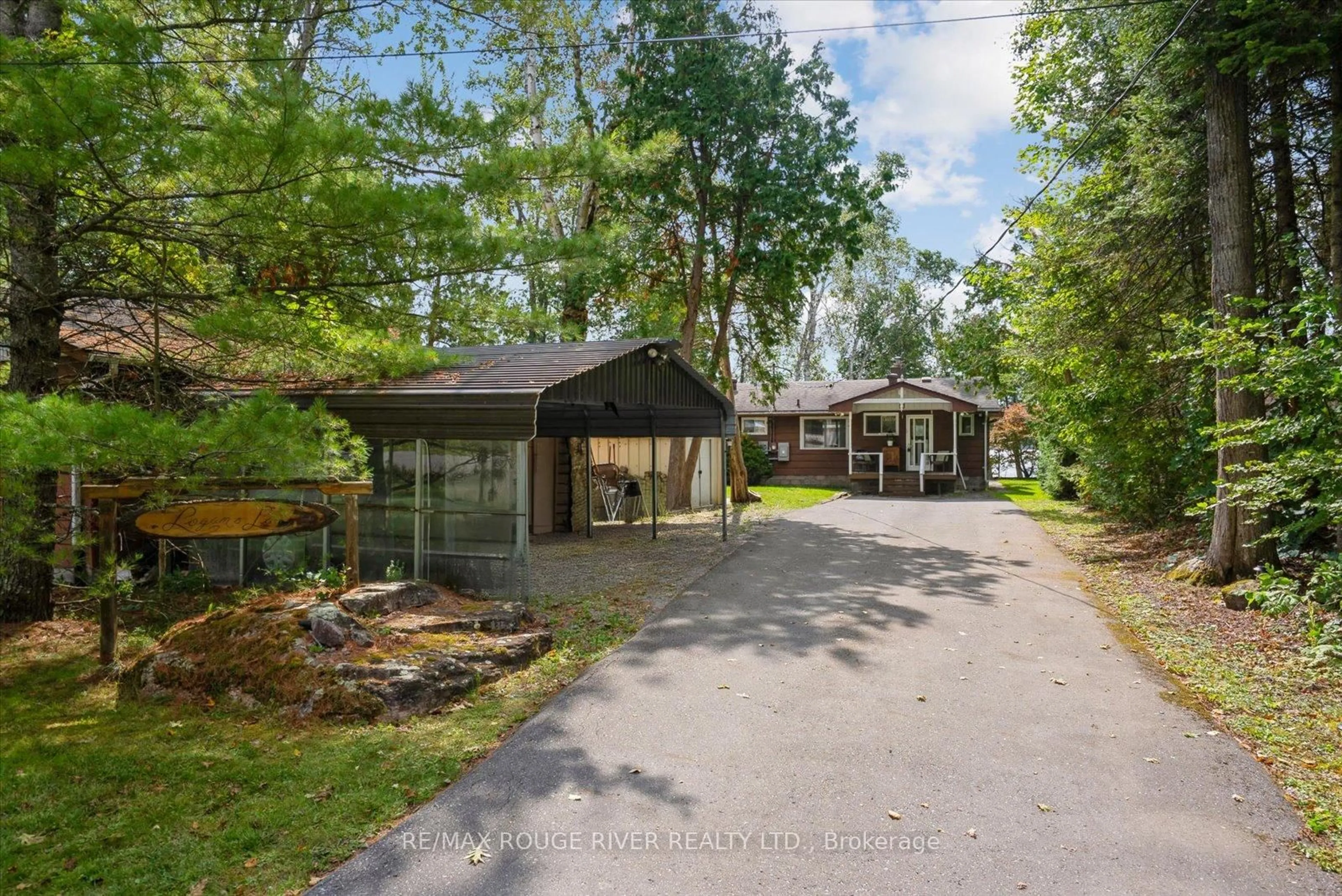 A pic from outside/outdoor area/front of a property/back of a property/a pic from drone, unknown for 102 Mystic Point Rd, Trent Lakes Ontario K0L 1J0
