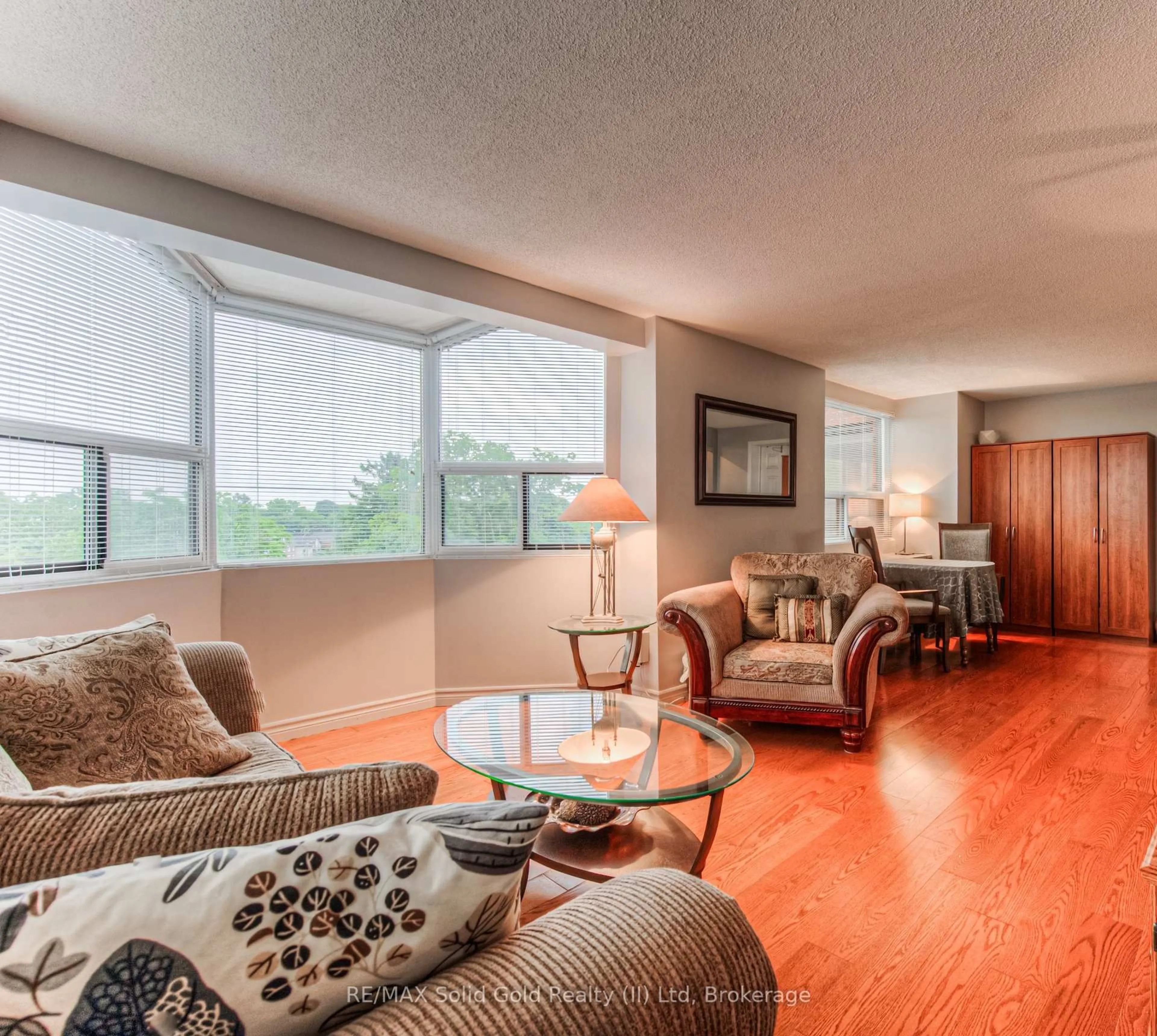 Living room with furniture, unknown for 20 Ellen St #611, Kitchener Ontario N2H 6R7