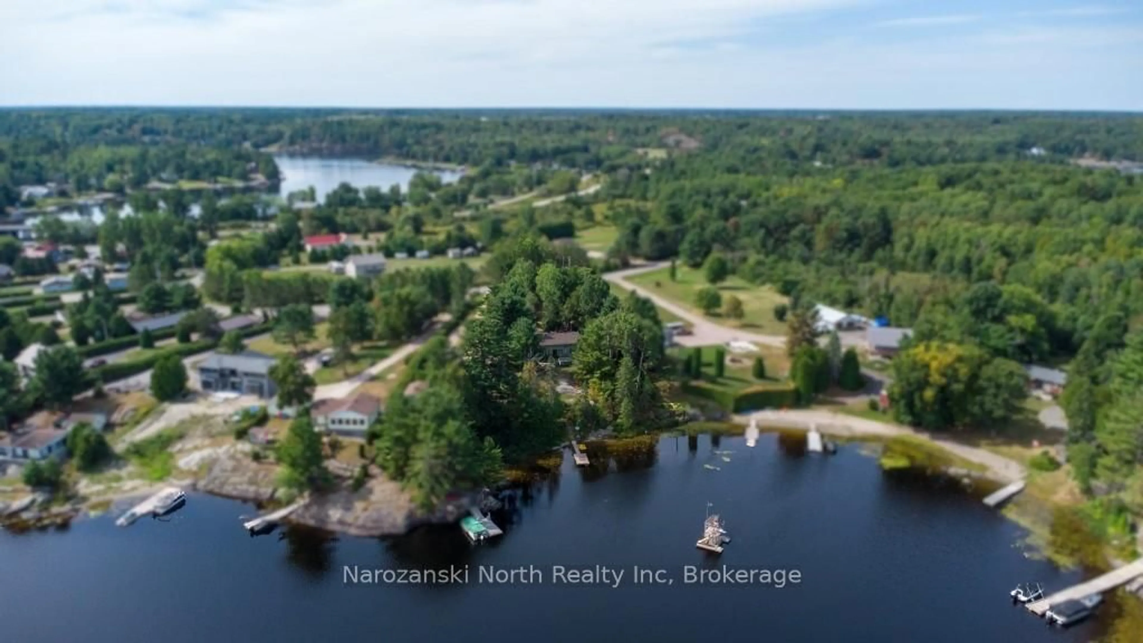 A pic from outside/outdoor area/front of a property/back of a property/a pic from drone, water/lake/river/ocean view for 64 Leger Rd, French River Ontario P0M 1A0