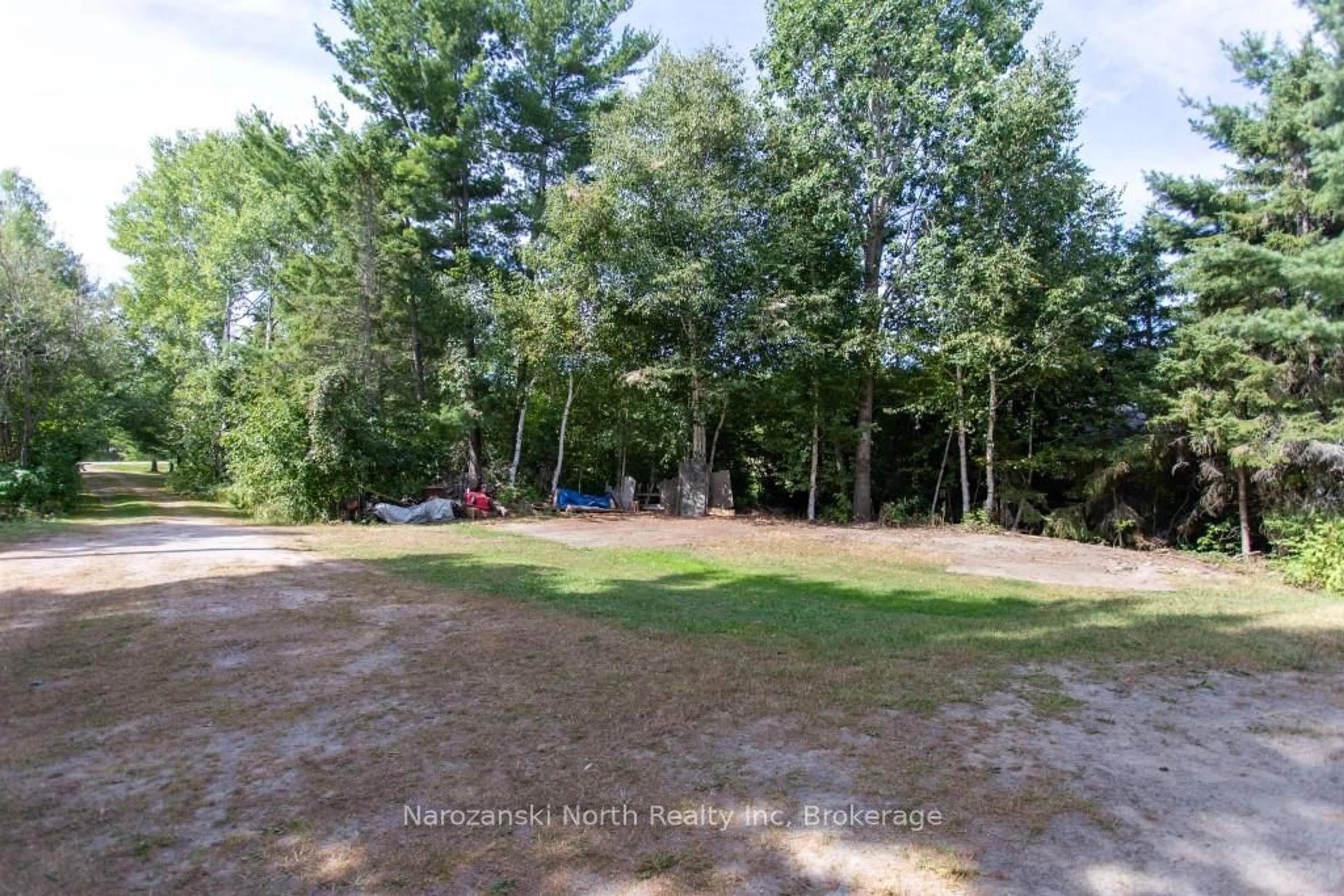 A pic from outside/outdoor area/front of a property/back of a property/a pic from drone, forest/trees view for 64 Leger Rd, French River Ontario P0M 1A0