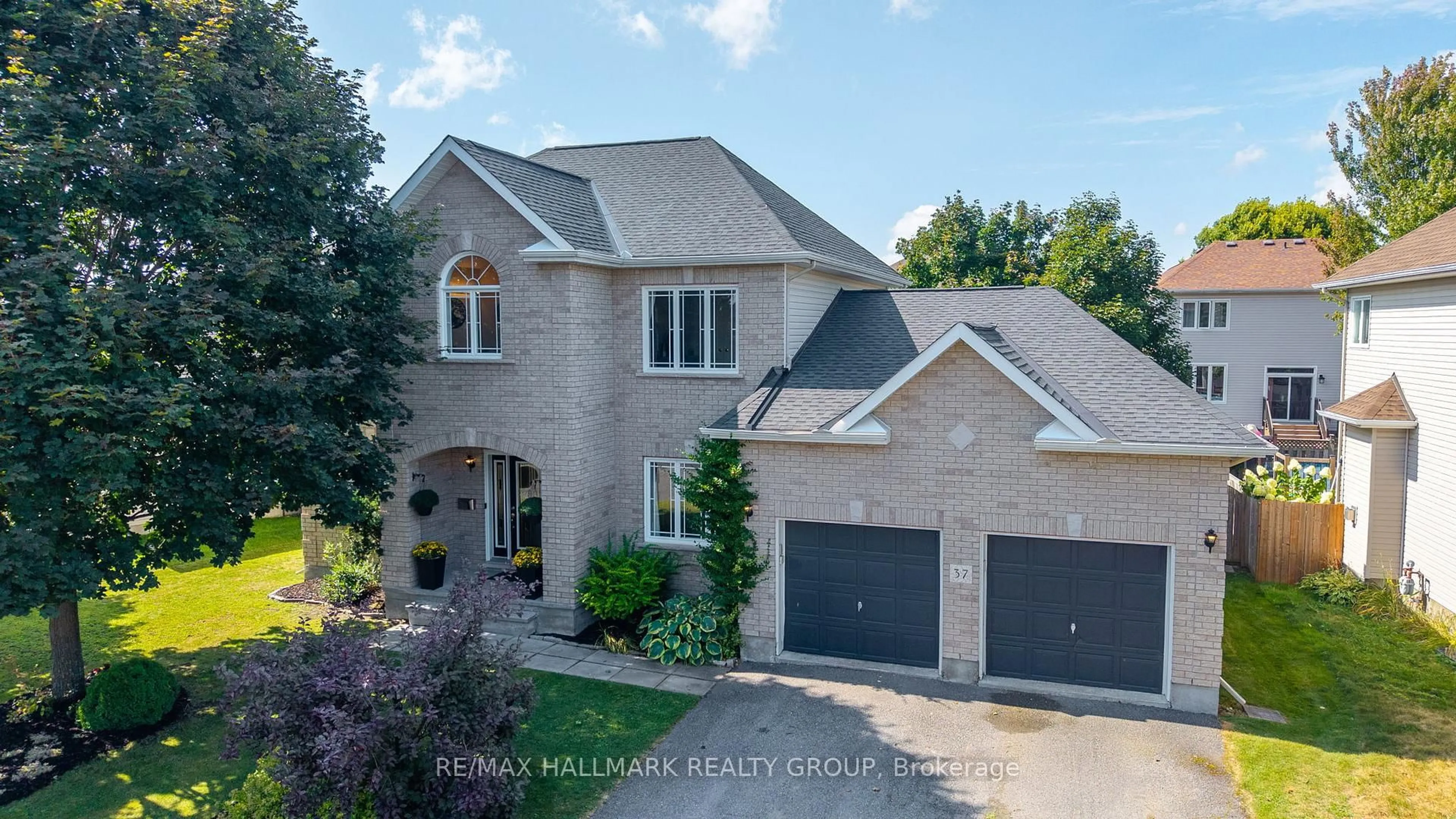 Home with brick exterior material, street for 37 Wilderness Way, Ottawa Ontario K2S 2E2