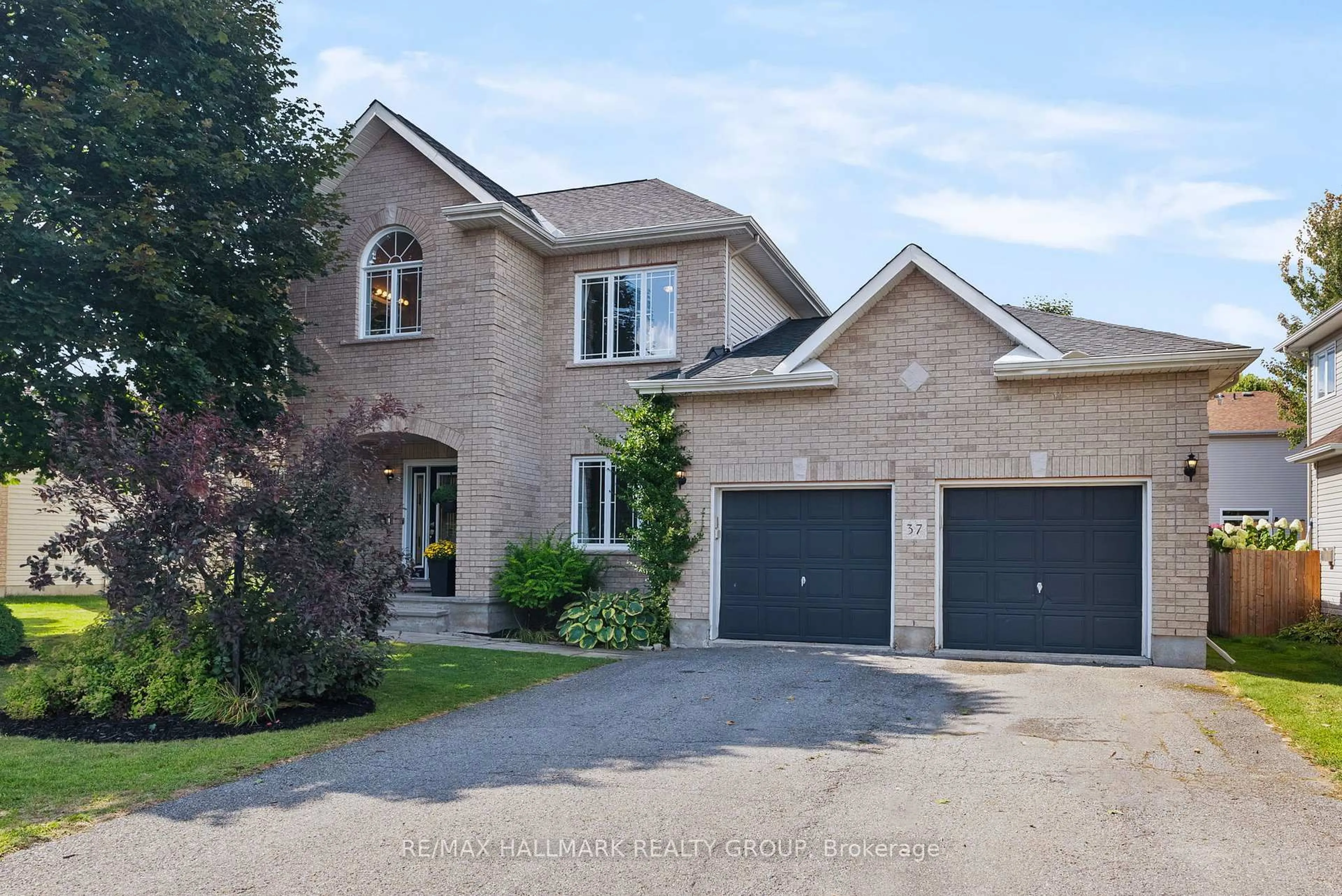 Home with brick exterior material, street for 37 Wilderness Way, Ottawa Ontario K2S 2E2