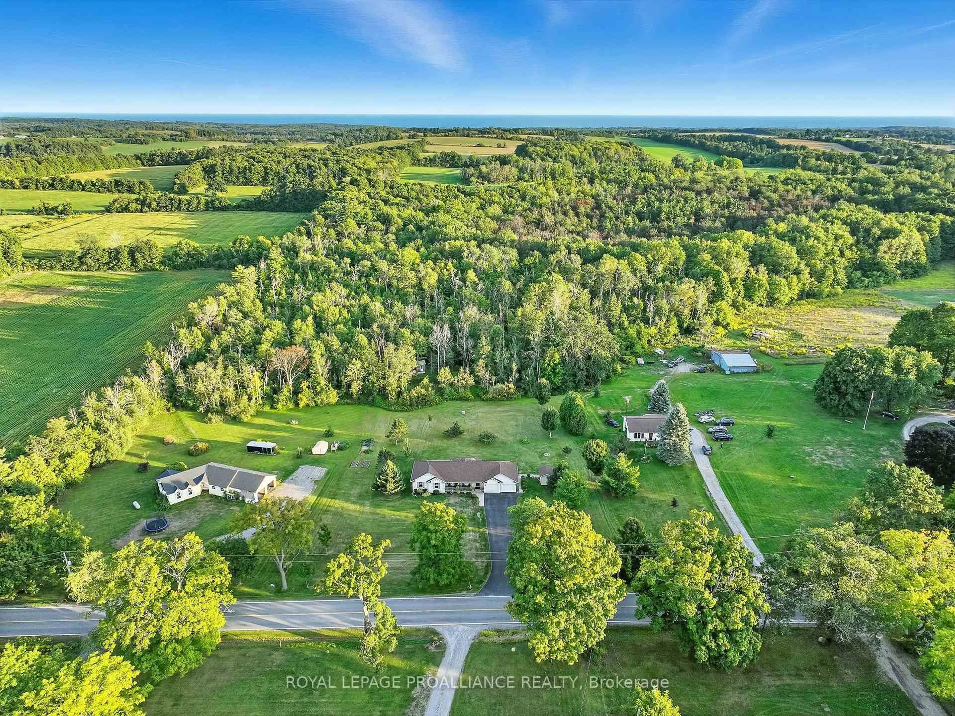 A pic from outside/outdoor area/front of a property/back of a property/a pic from drone, forest/trees view for 13799 County 21 Rd, Cramahe Ontario K0K 1S0