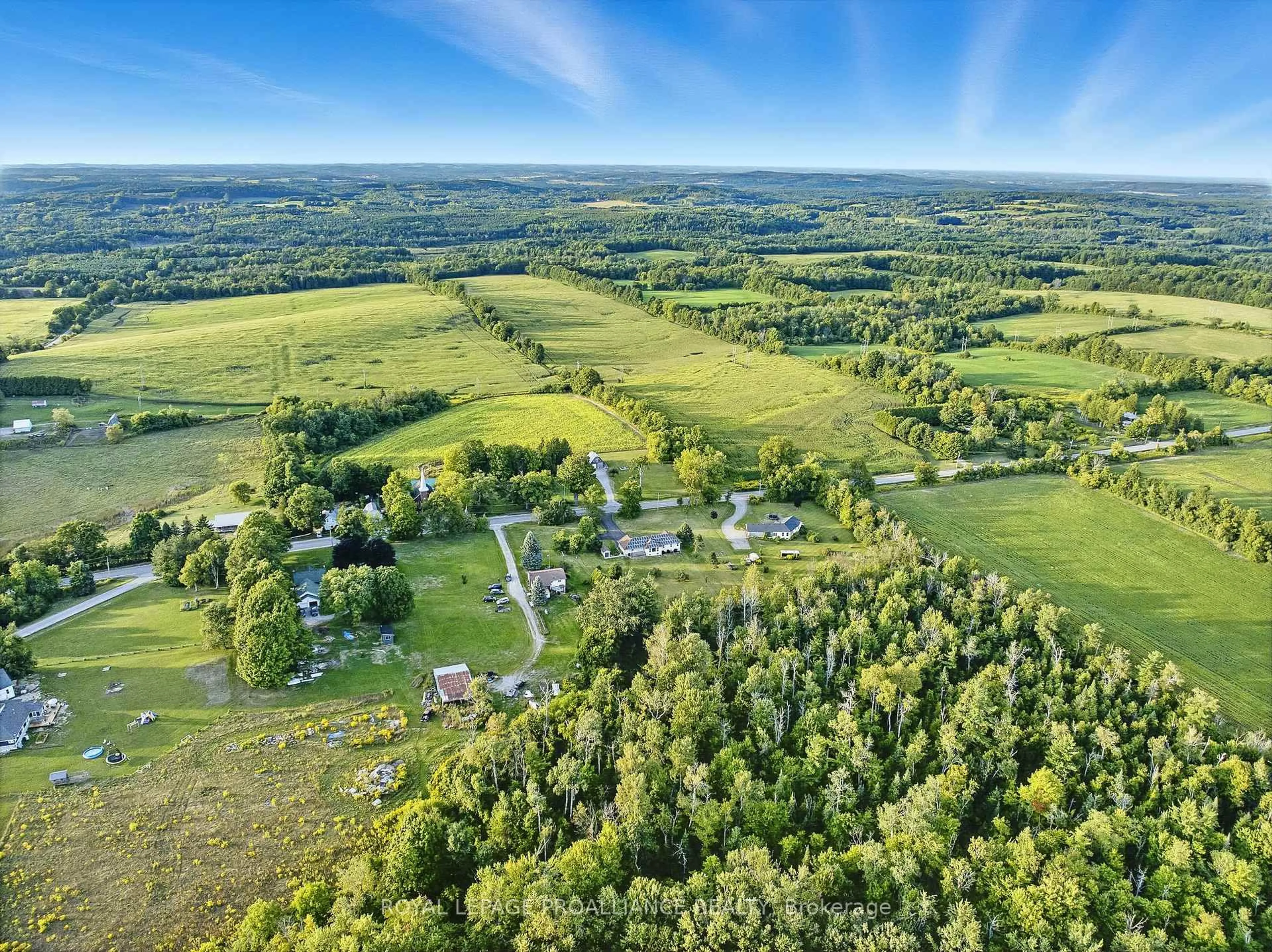 A pic from outside/outdoor area/front of a property/back of a property/a pic from drone, forest/trees view for 13799 County 21 Rd, Cramahe Ontario K0K 1S0
