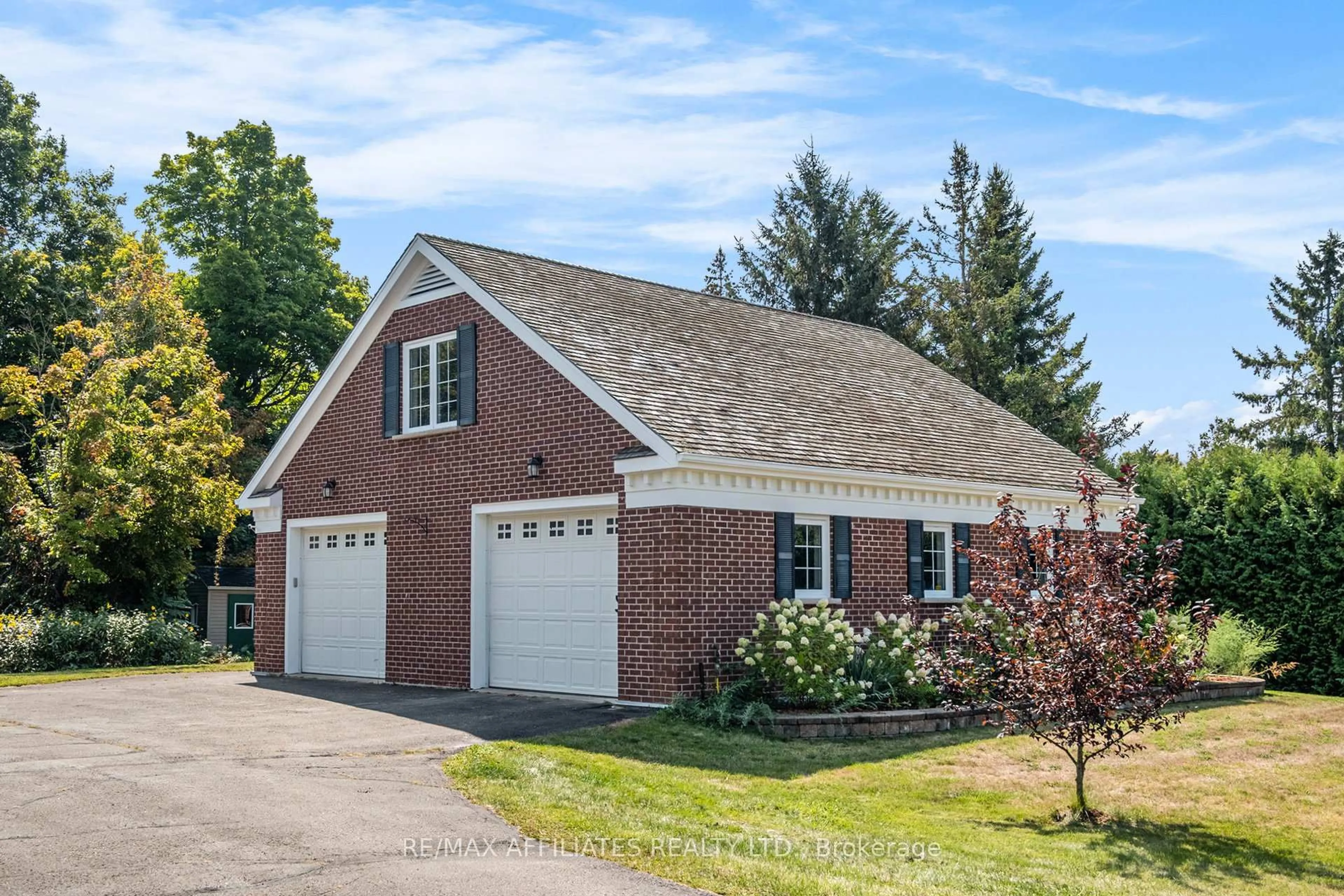 Home with brick exterior material, street for 21 Cedar Lane, Rideau Lakes Ontario K7A 4S5