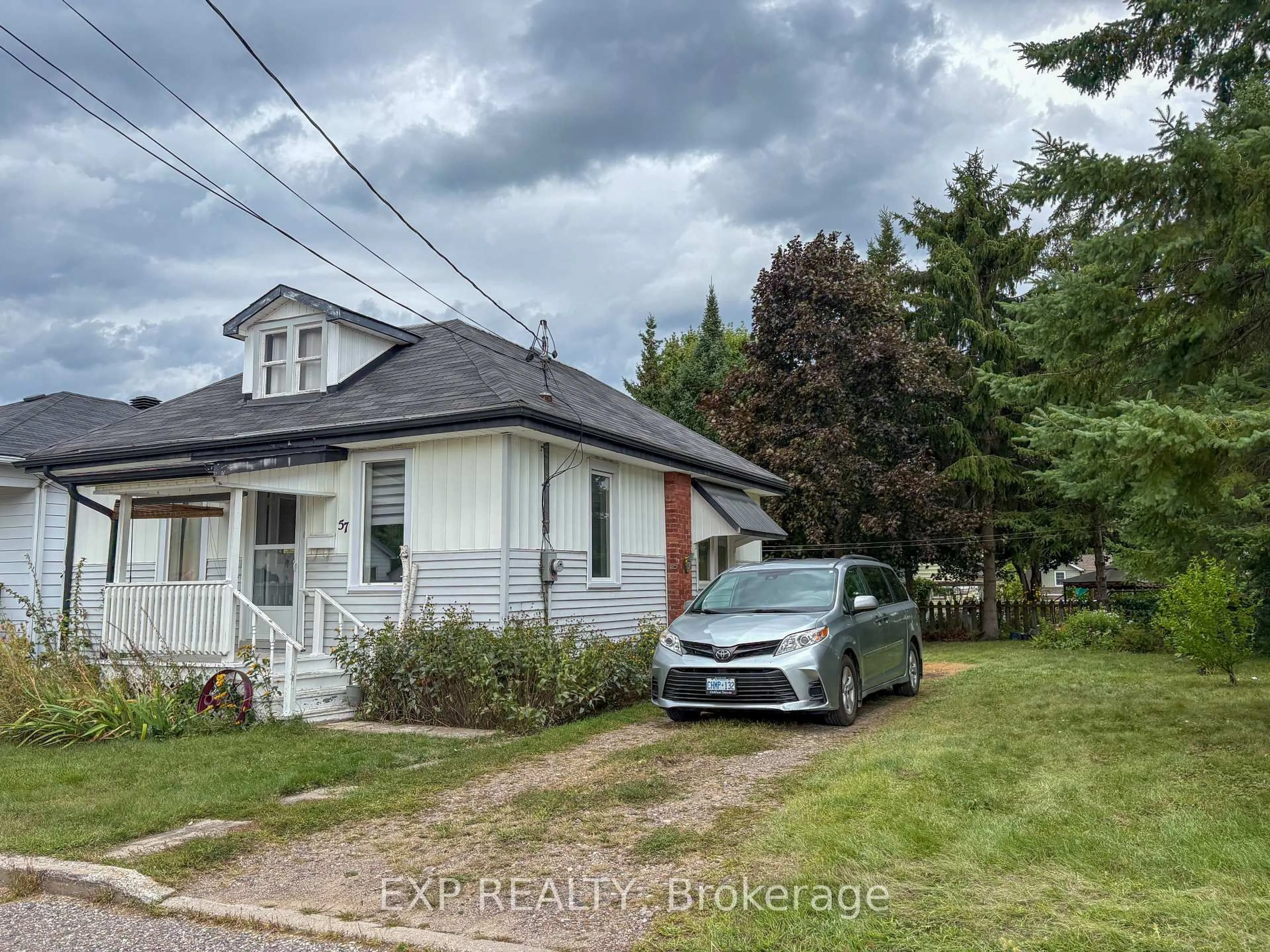 A pic from outside/outdoor area/front of a property/back of a property/a pic from drone, street for 57 Bank St, Renfrew Ontario K7V 2E5