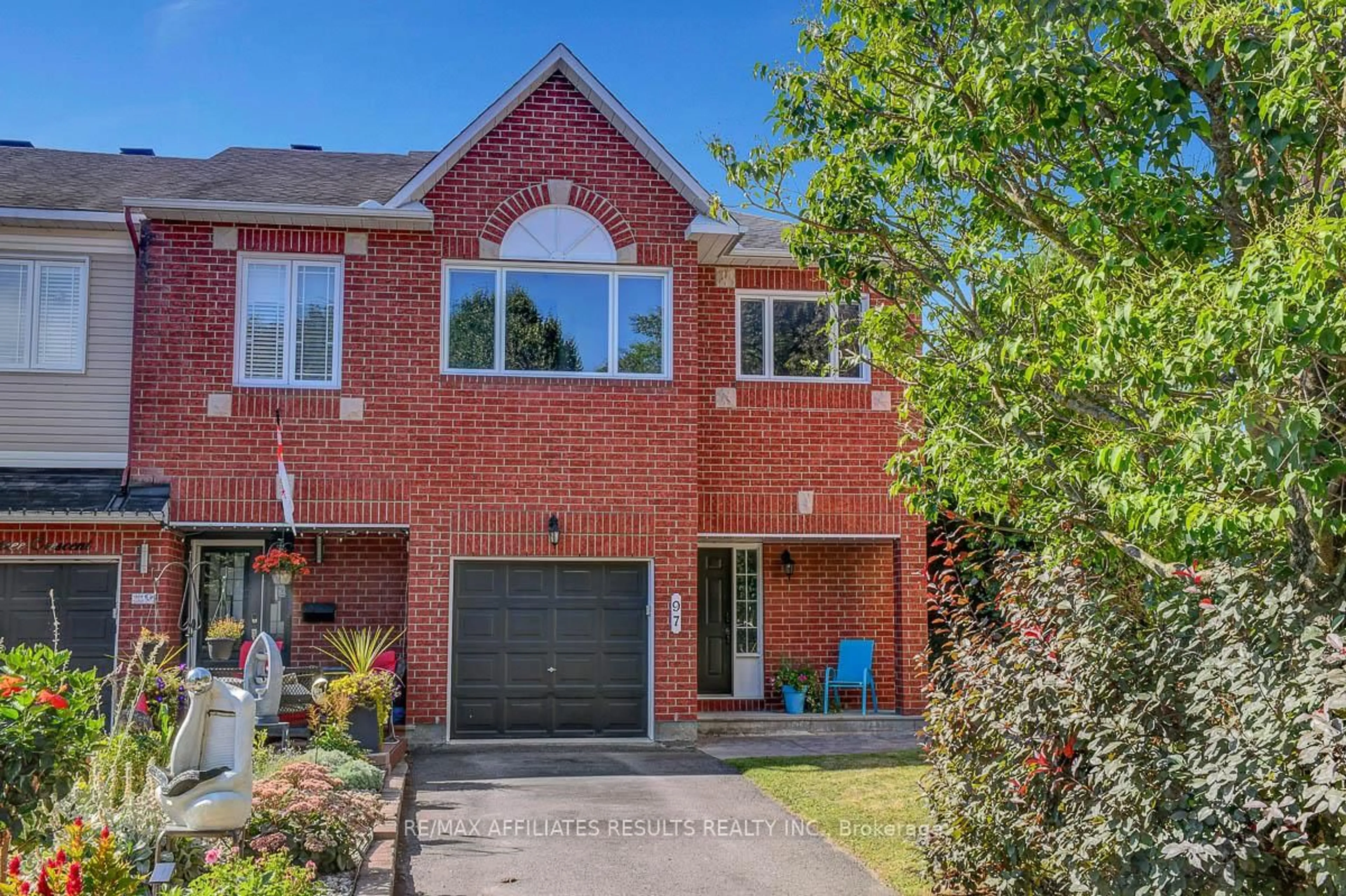 Home with brick exterior material, street for 97 Flowertree Cres, Ottawa Ontario K2M 2R7