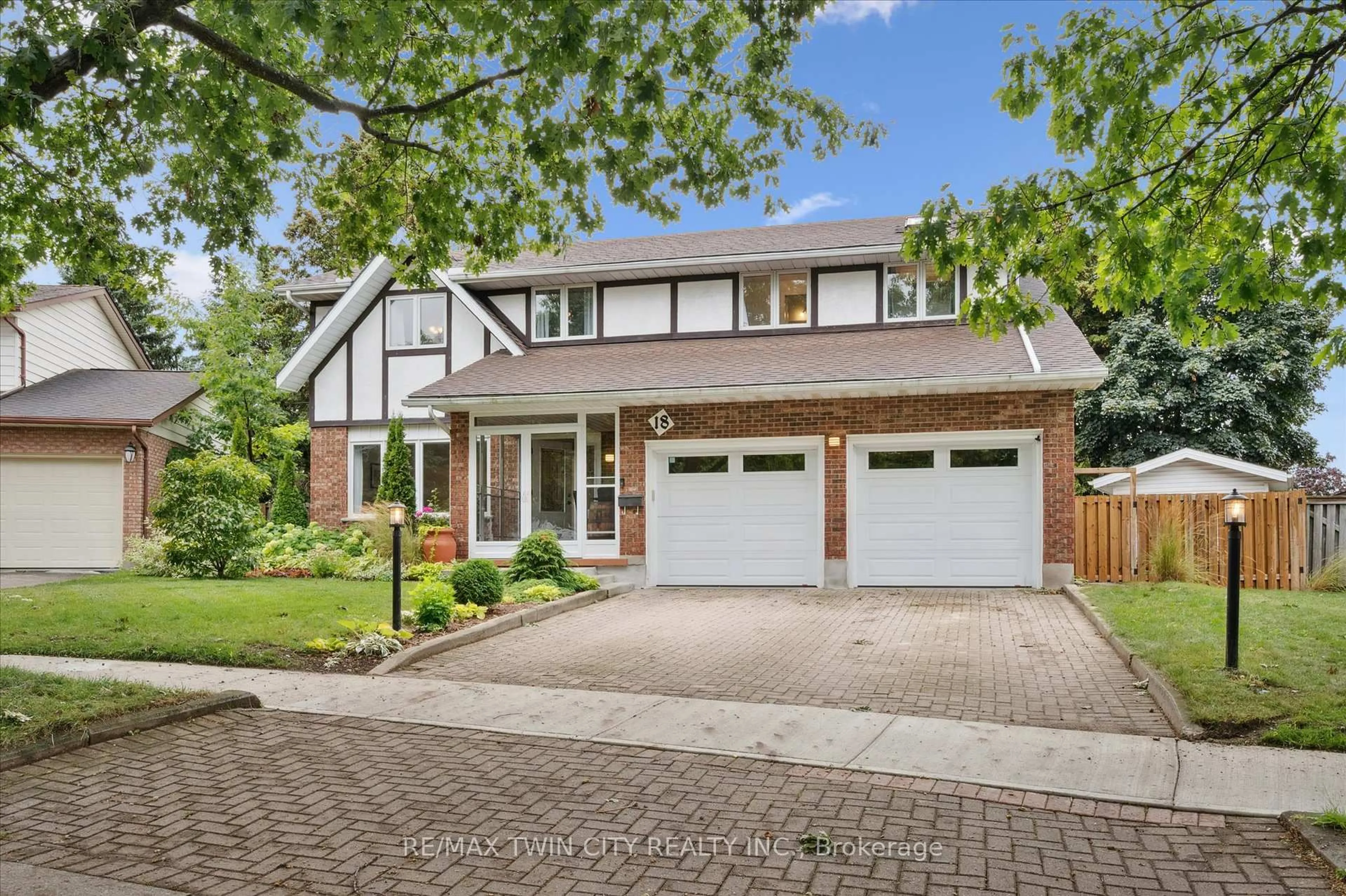 Home with brick exterior material, street for 18 Westchester Pl, Kitchener Ontario N2B 3M6