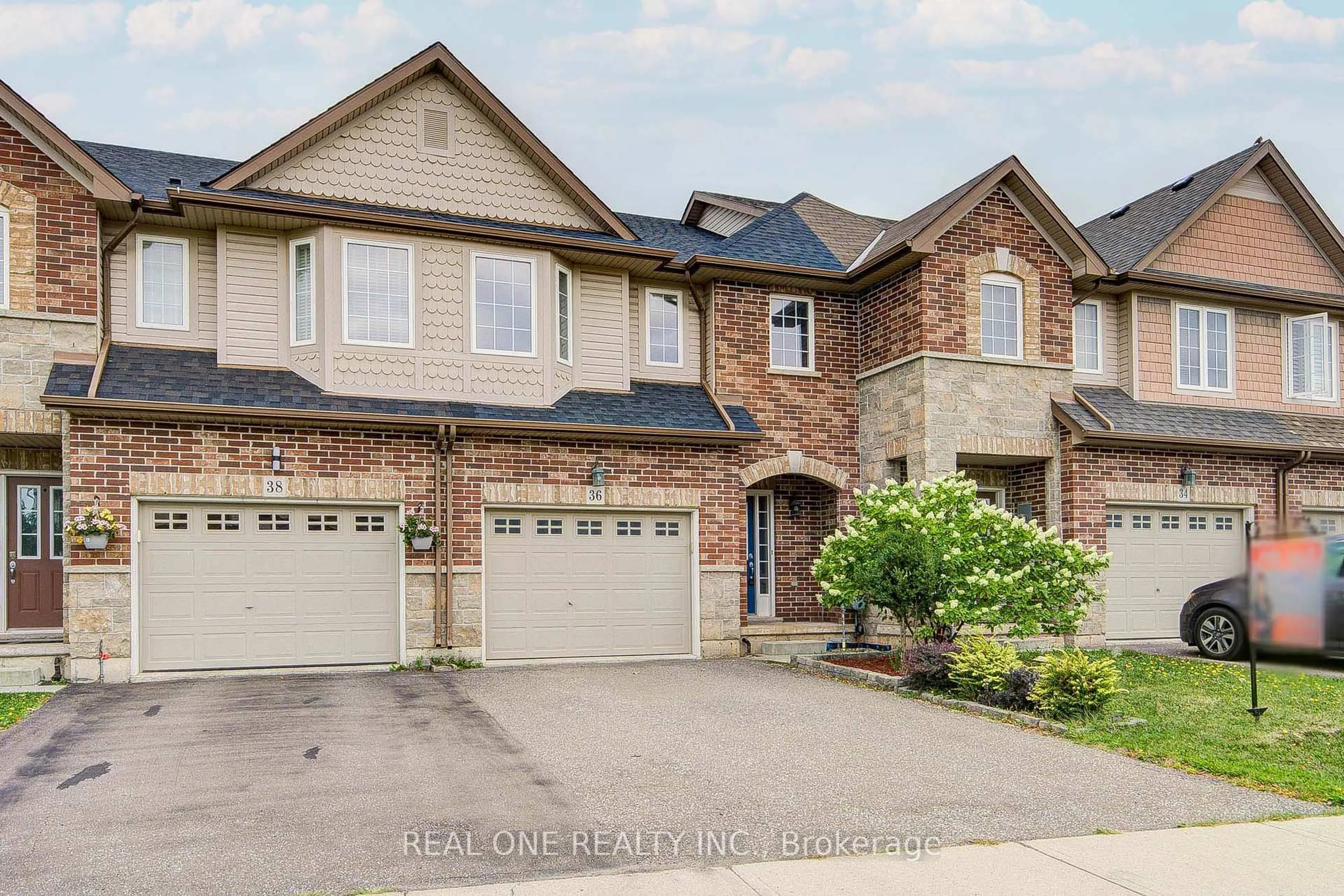 Home with brick exterior material, street for 36 Palacebeach Tr, Hamilton Ontario L8E 5C3