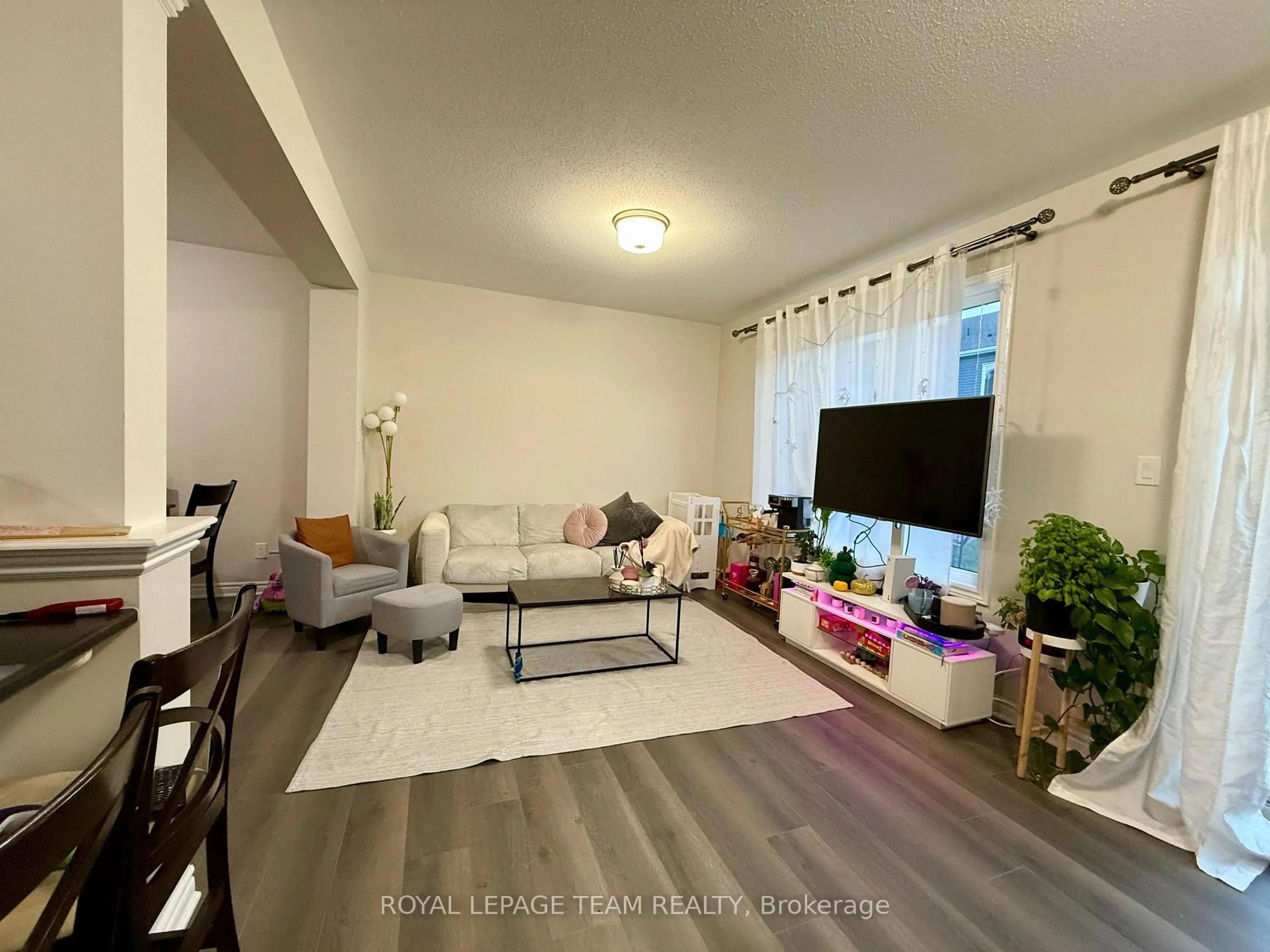 Living room with furniture, unknown for 709 Megrez Way.,, Ottawa Ontario K2J 6S9
