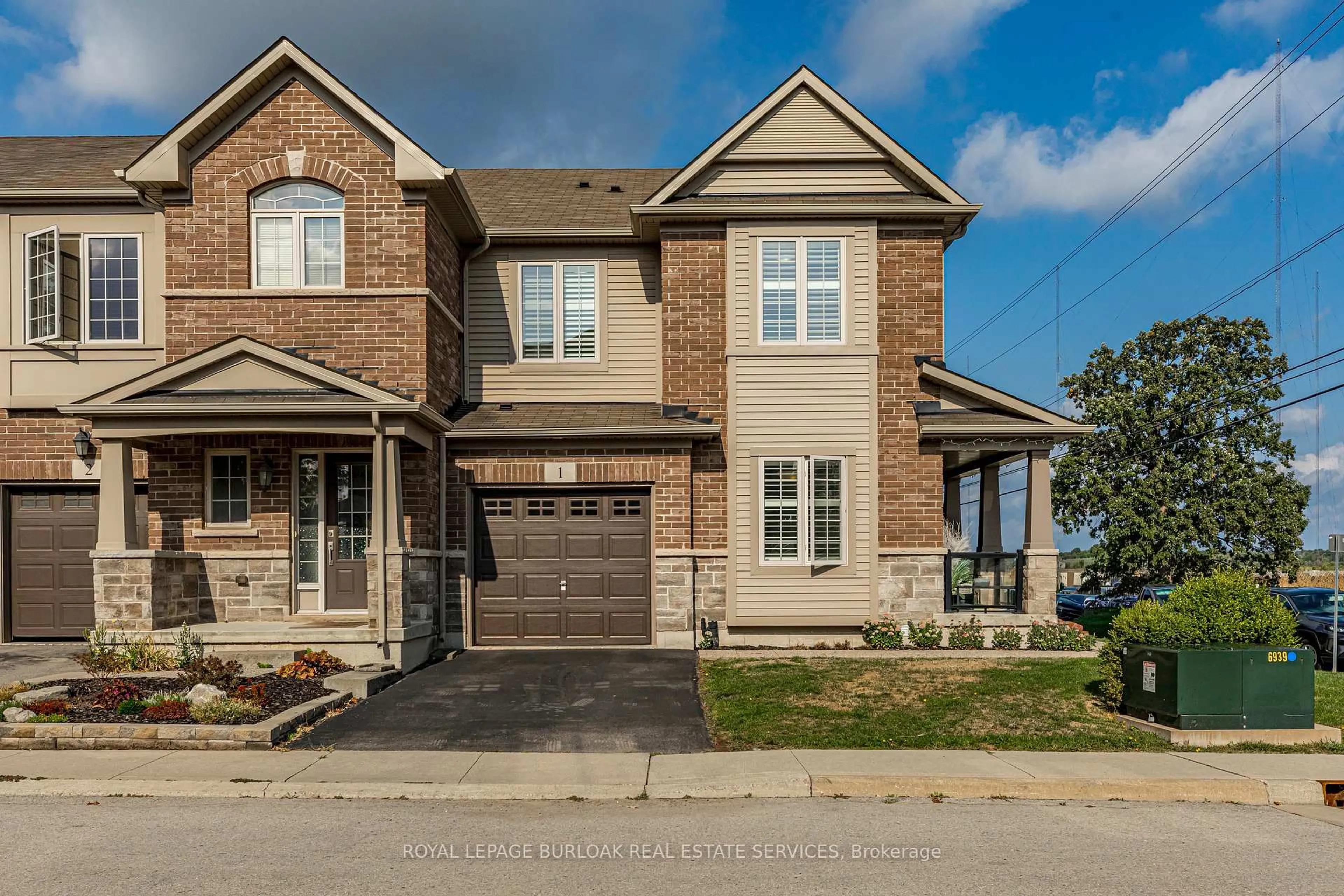 Home with brick exterior material, street for 515 Winston Rd #1, Grimsby Ontario L3M 0C8