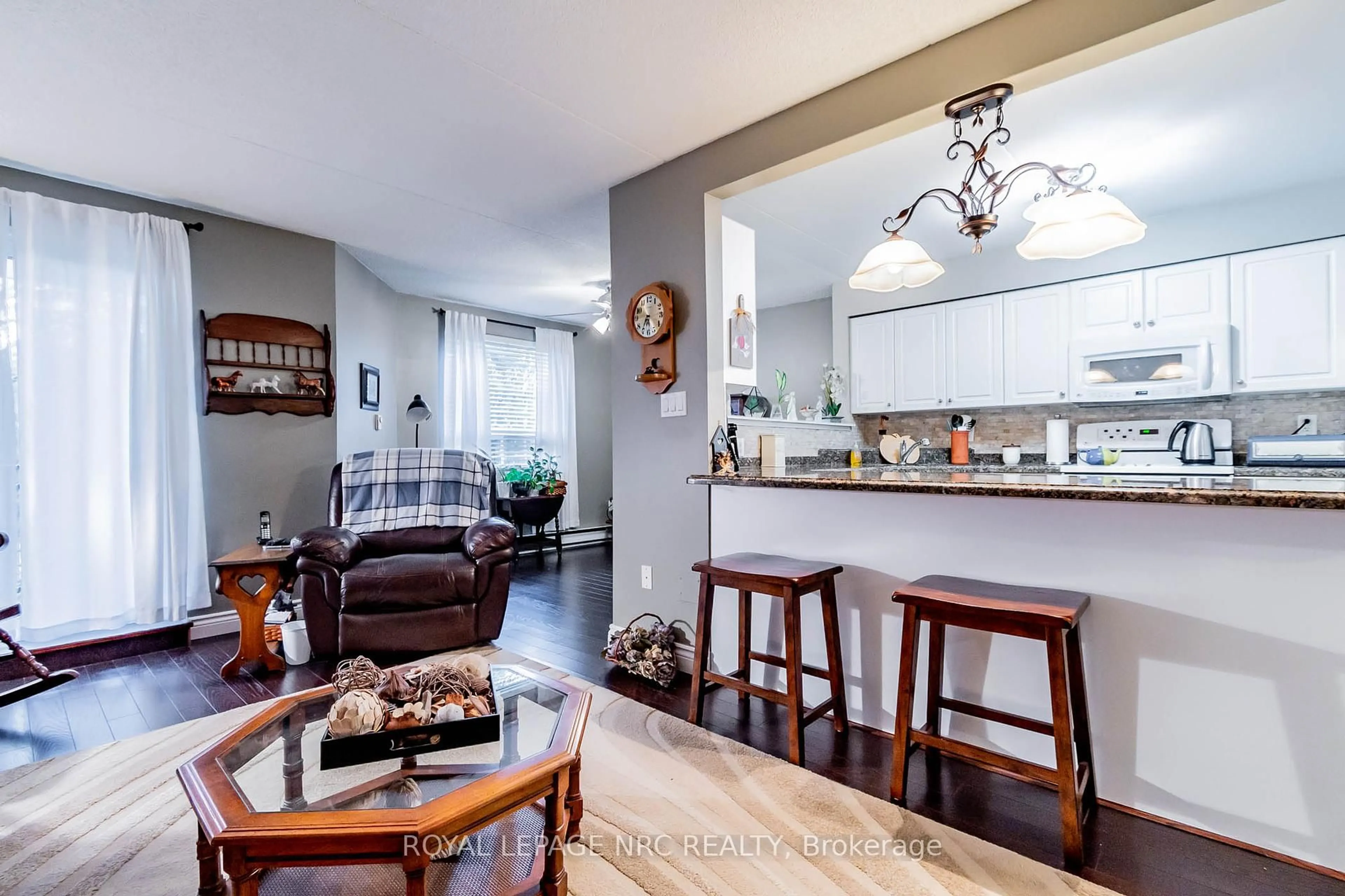 Open concept kitchen, unknown for 4658 Drummond Rd #230, Niagara Falls Ontario L2E 7E1