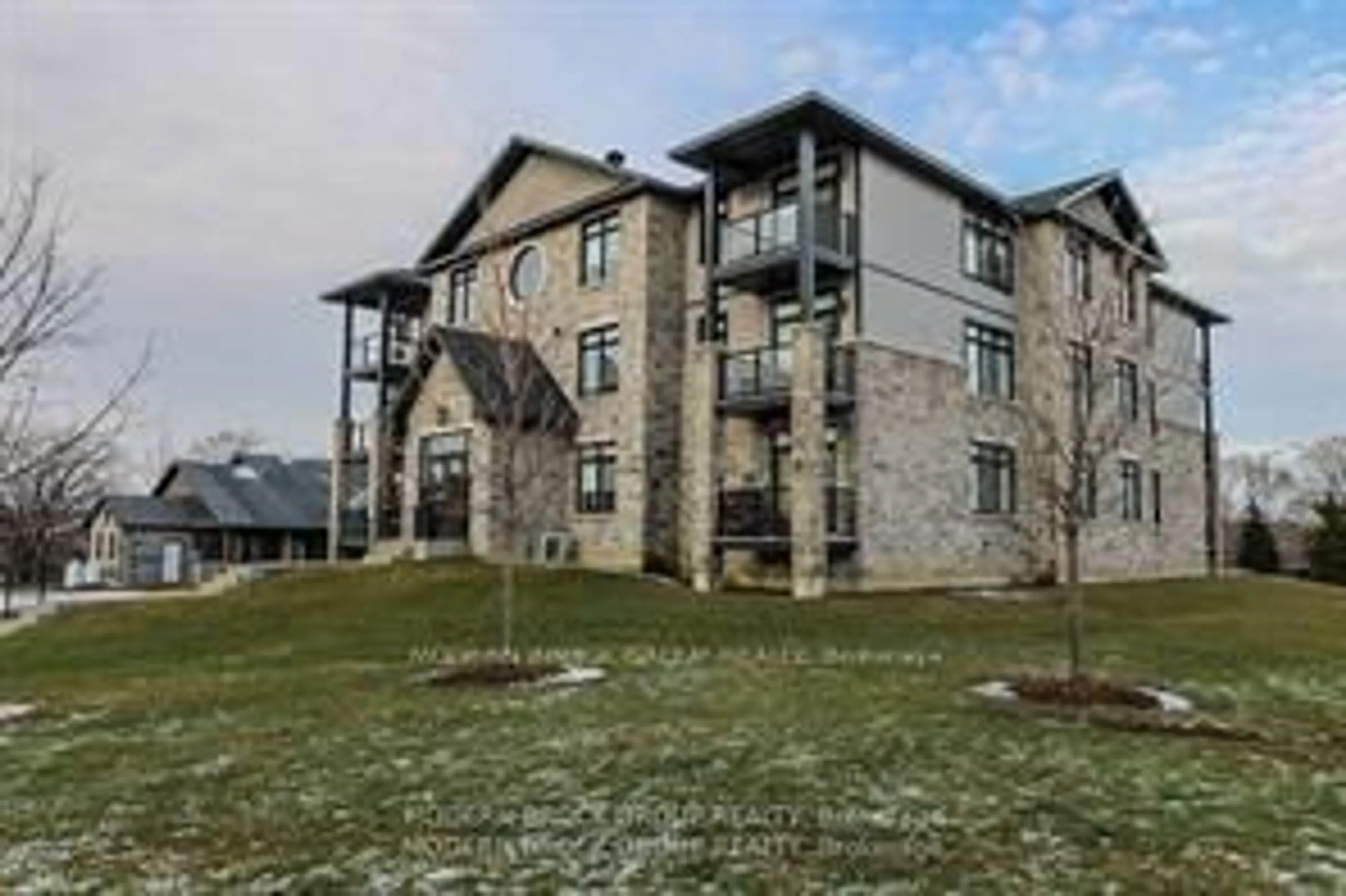 A pic from outside/outdoor area/front of a property/back of a property/a pic from drone, building for 1109 Millwood Ave #103, Brockville Ontario K6V 0C7
