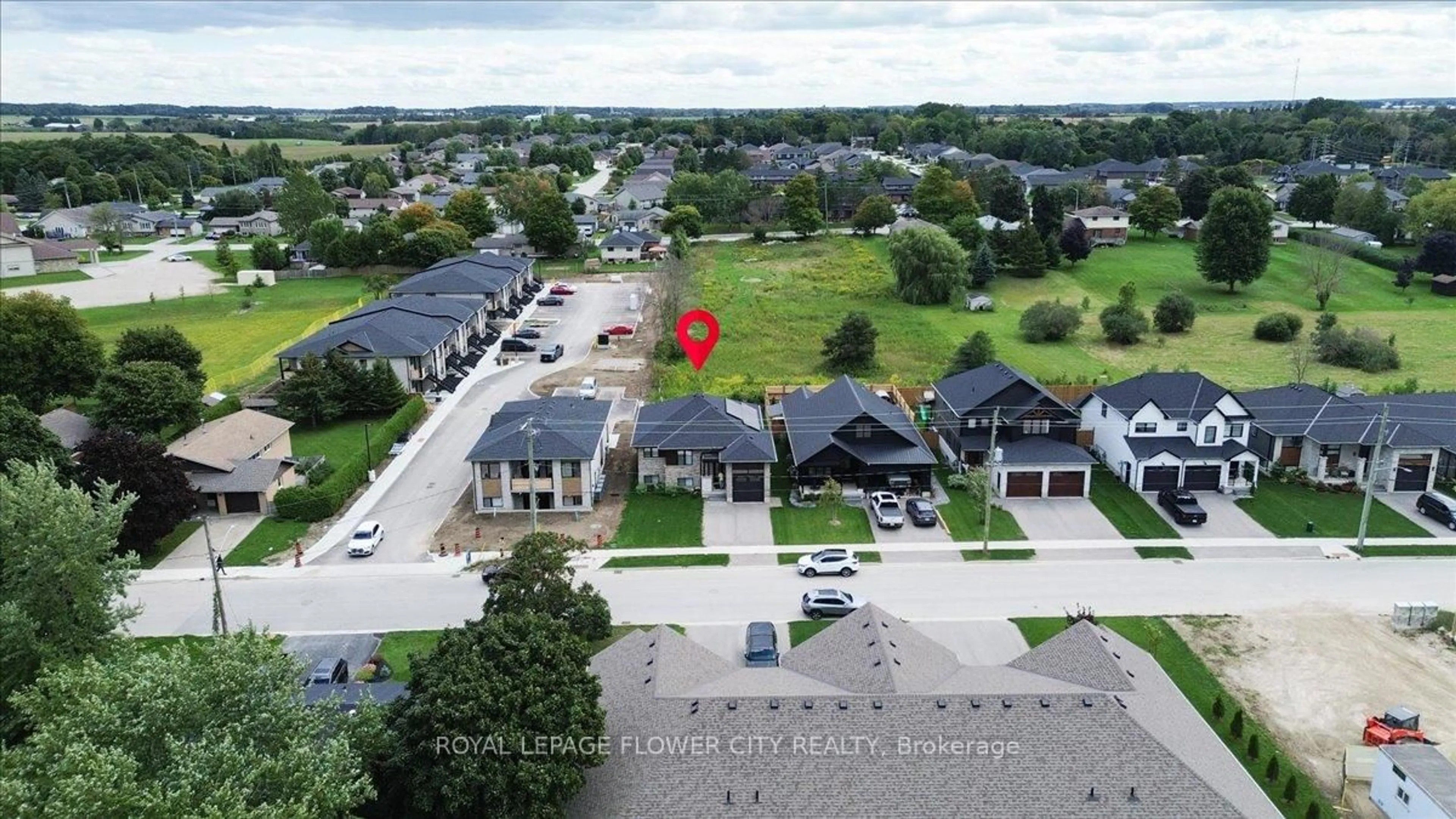 A pic from outside/outdoor area/front of a property/back of a property/a pic from drone, street for 430 Wellington St, Wellington North Ontario N0G 2L4
