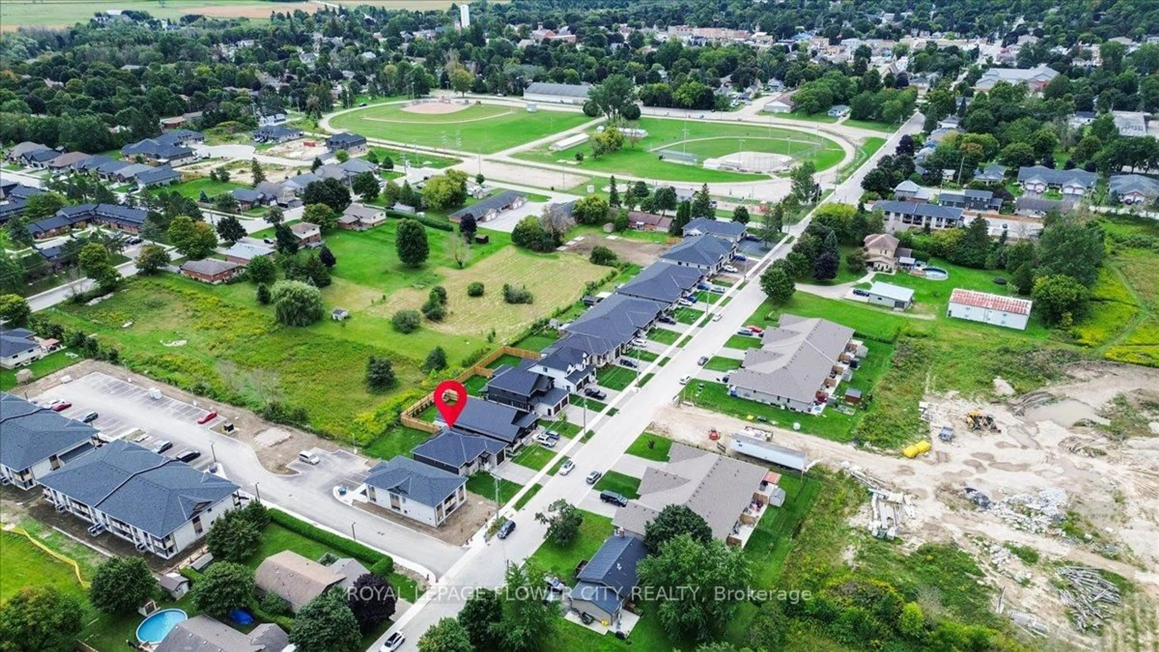 A pic from outside/outdoor area/front of a property/back of a property/a pic from drone, street for 430 Wellington St, Wellington North Ontario N0G 2L4