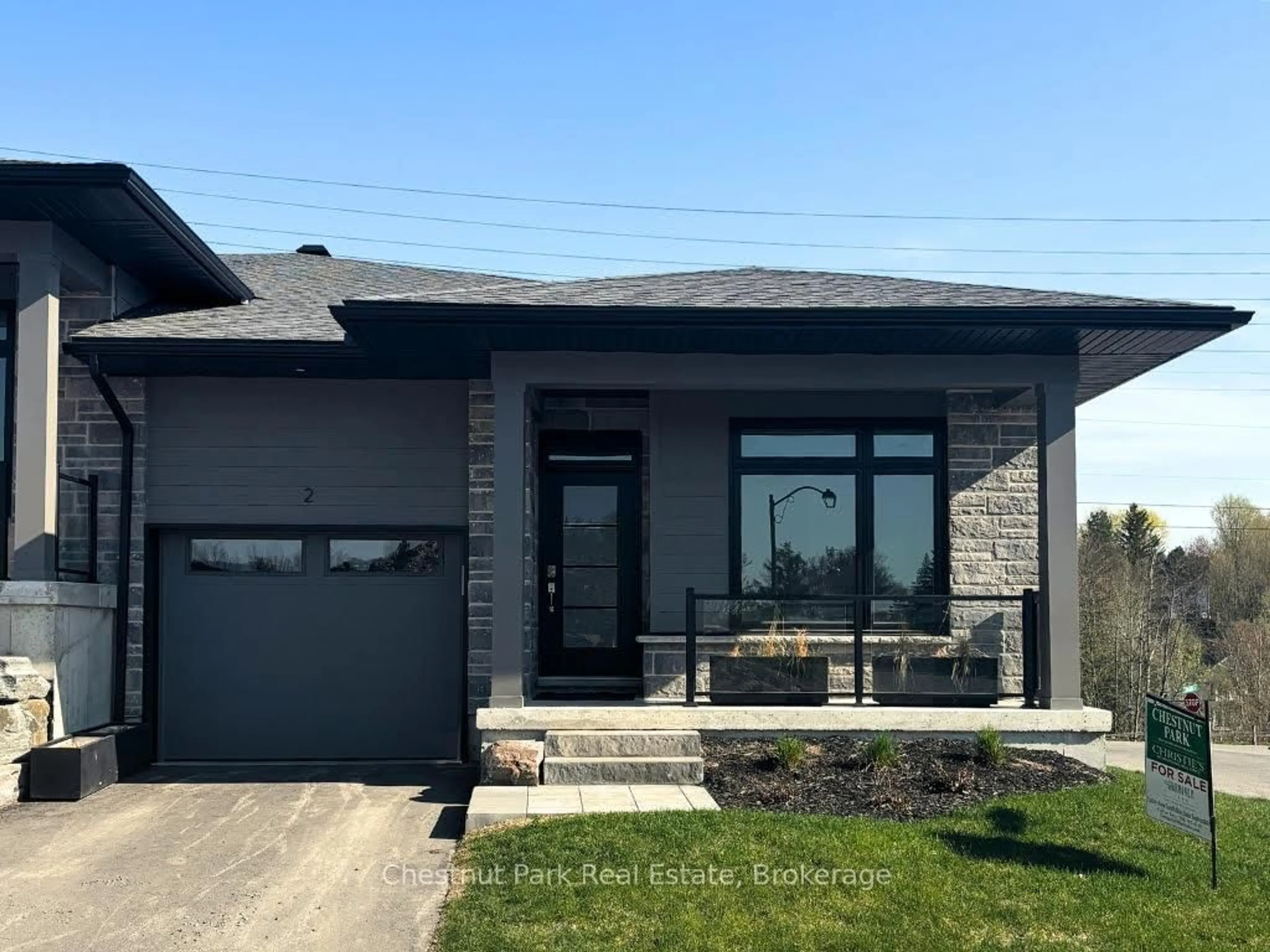 Home with brick exterior material, street for 2 BLACK SPRUCE St, Huntsville Ontario P1H 1M3