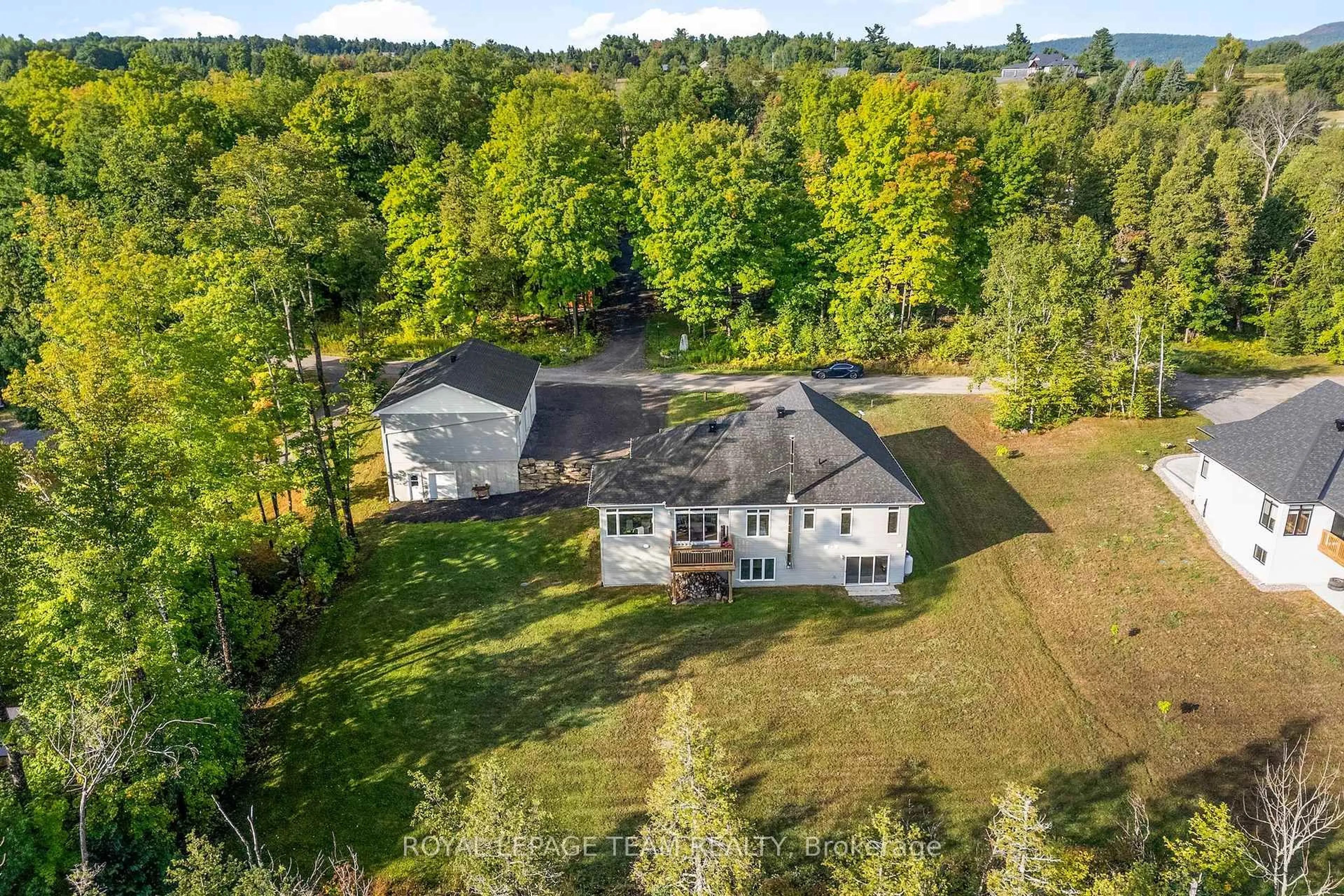 A pic from outside/outdoor area/front of a property/back of a property/a pic from drone, water/lake/river/ocean view for 44 Morning Flight Crt, Calabogie Ontario K0J 1H0