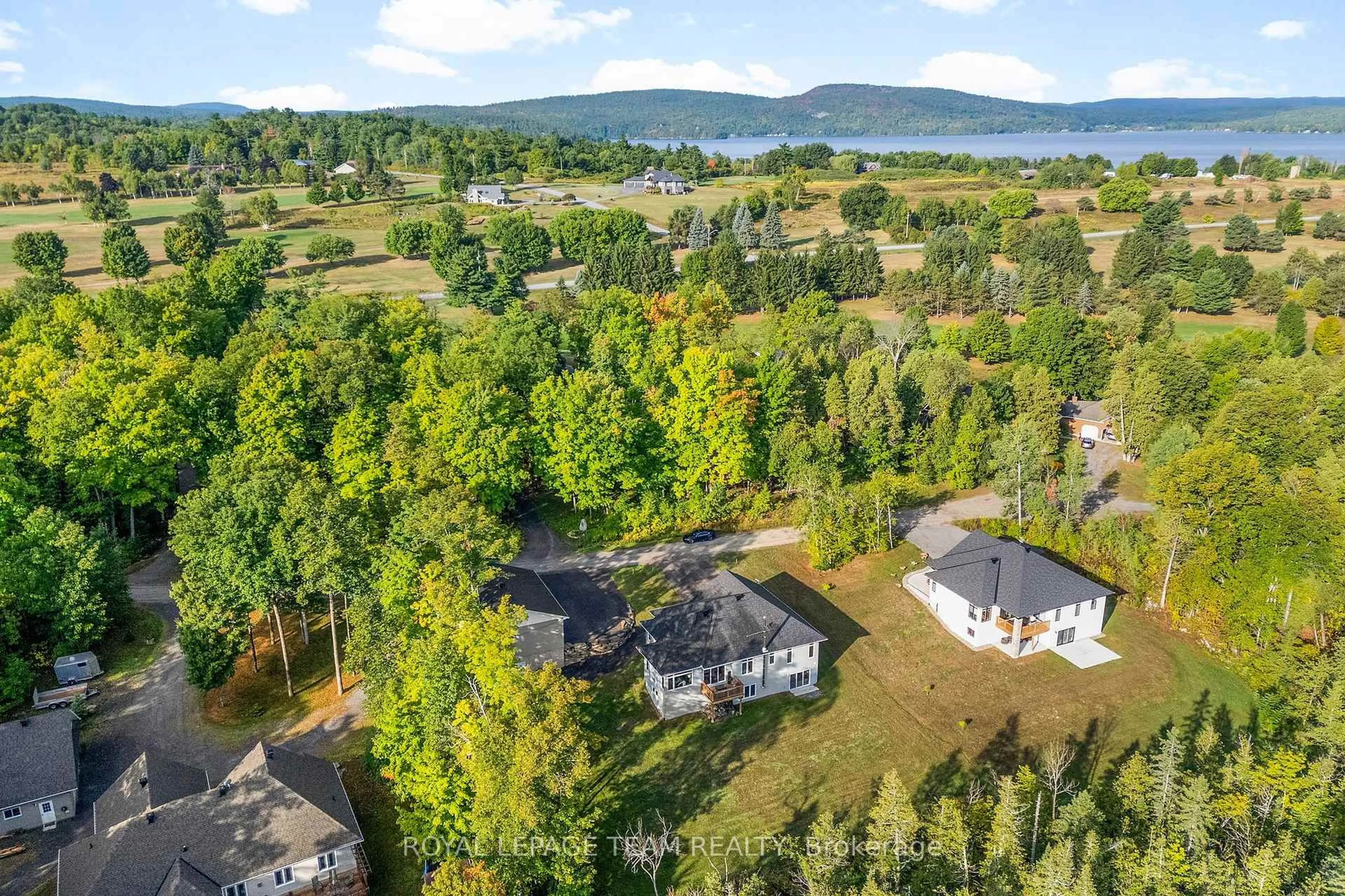 A pic from outside/outdoor area/front of a property/back of a property/a pic from drone, water/lake/river/ocean view for 44 Morning Flight Crt, Calabogie Ontario K0J 1H0