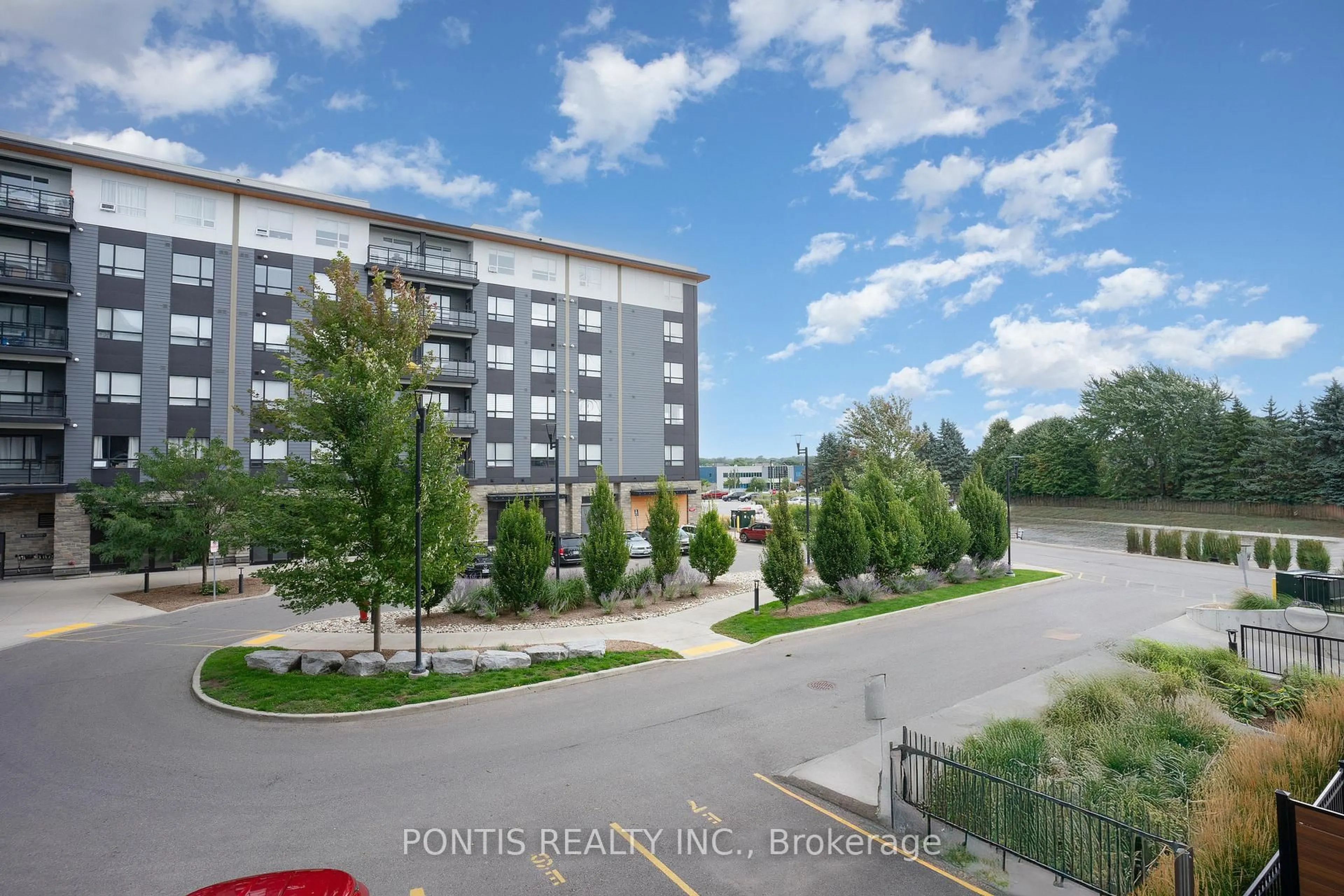 Patio, city buildings view from balcony for 251 Northfield Dr #207, Waterloo Ontario N2K 0G9