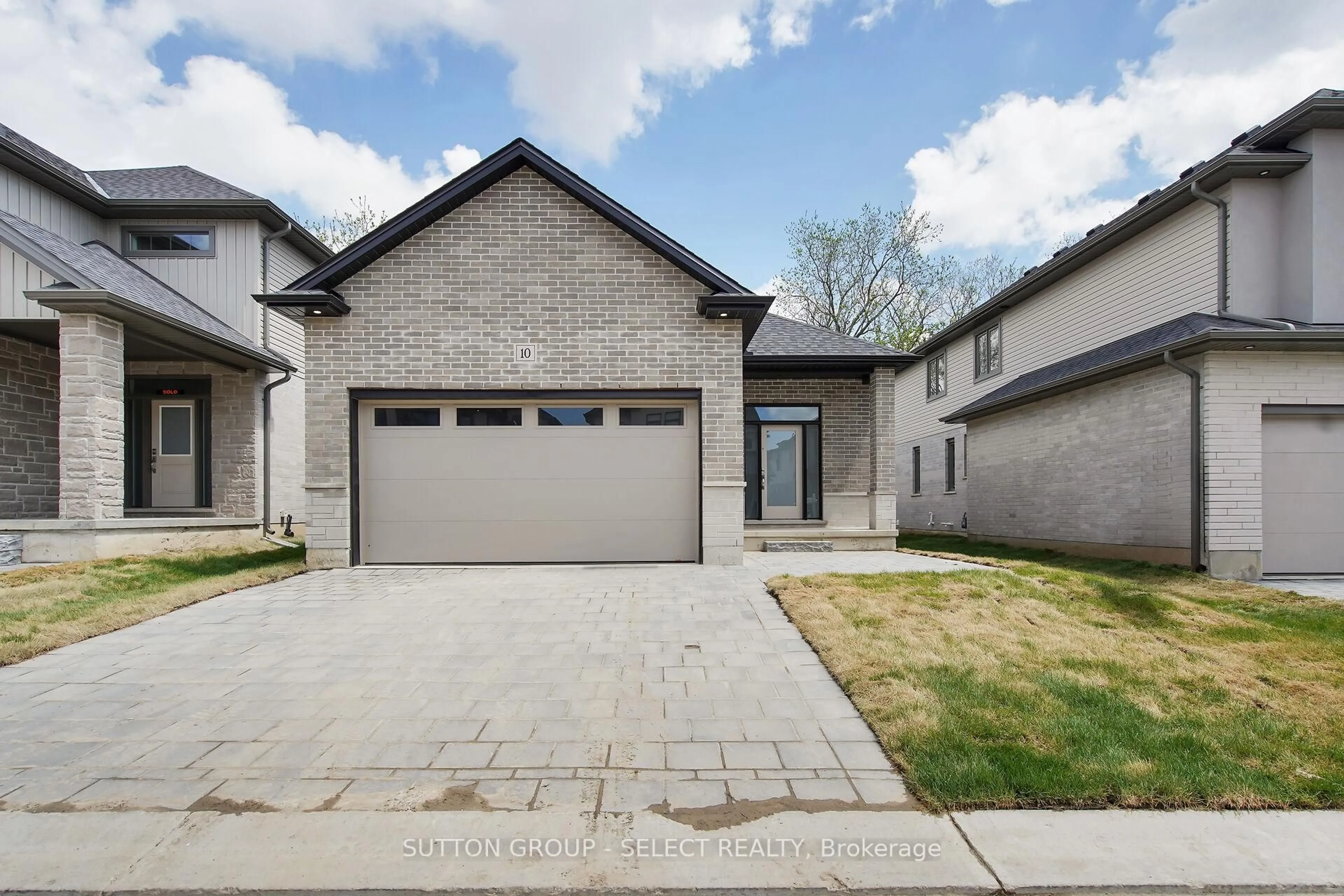 Home with brick exterior material, street for 7966 Fallon Dr #10, Lucan Biddulph Ontario N0M 1V0