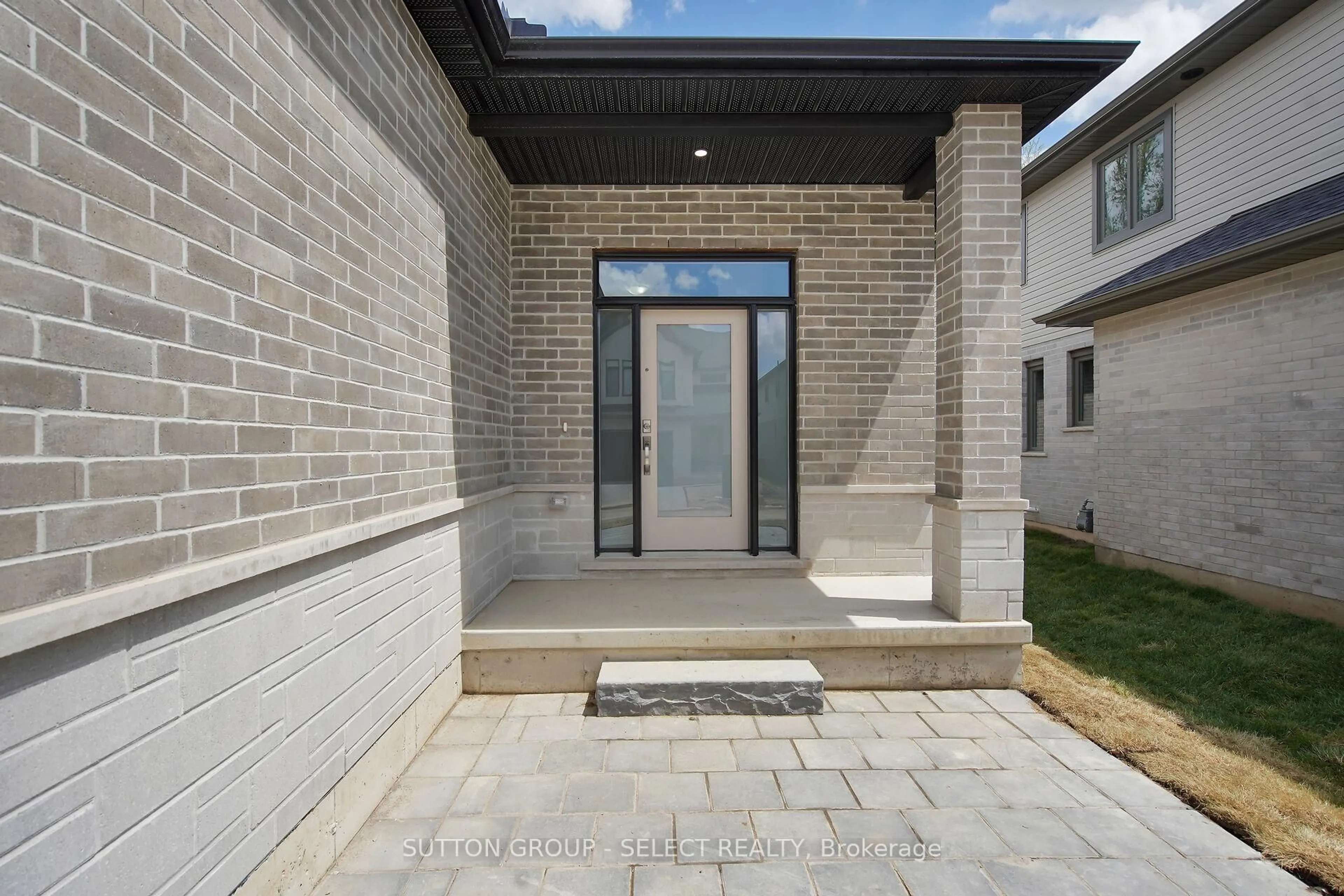 Home with brick exterior material, street for 7966 Fallon Dr #10, Lucan Biddulph Ontario N0M 1V0