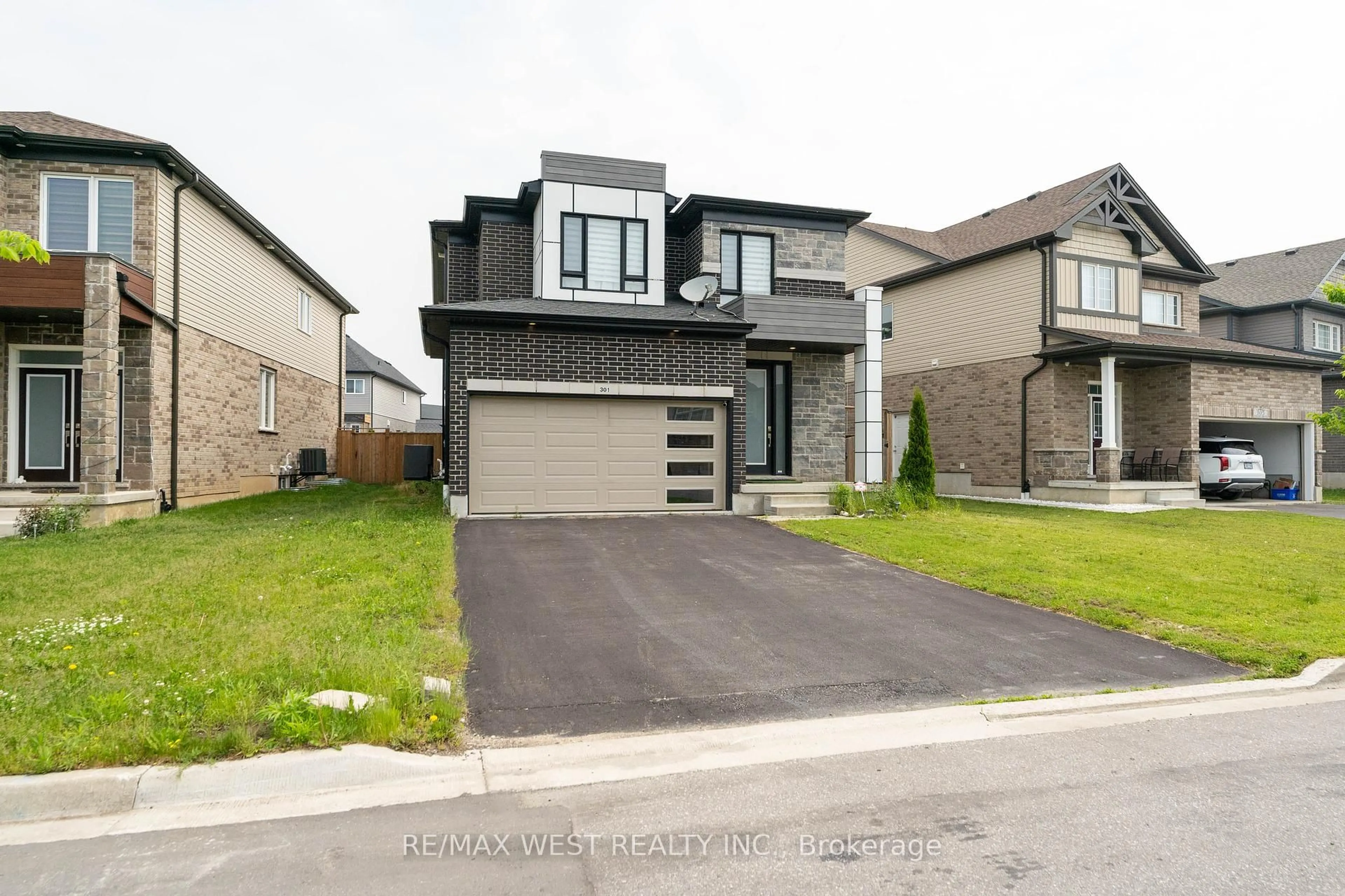 Home with brick exterior material, street for 301 Freure Dr, Cambridge Ontario N1S 0B5