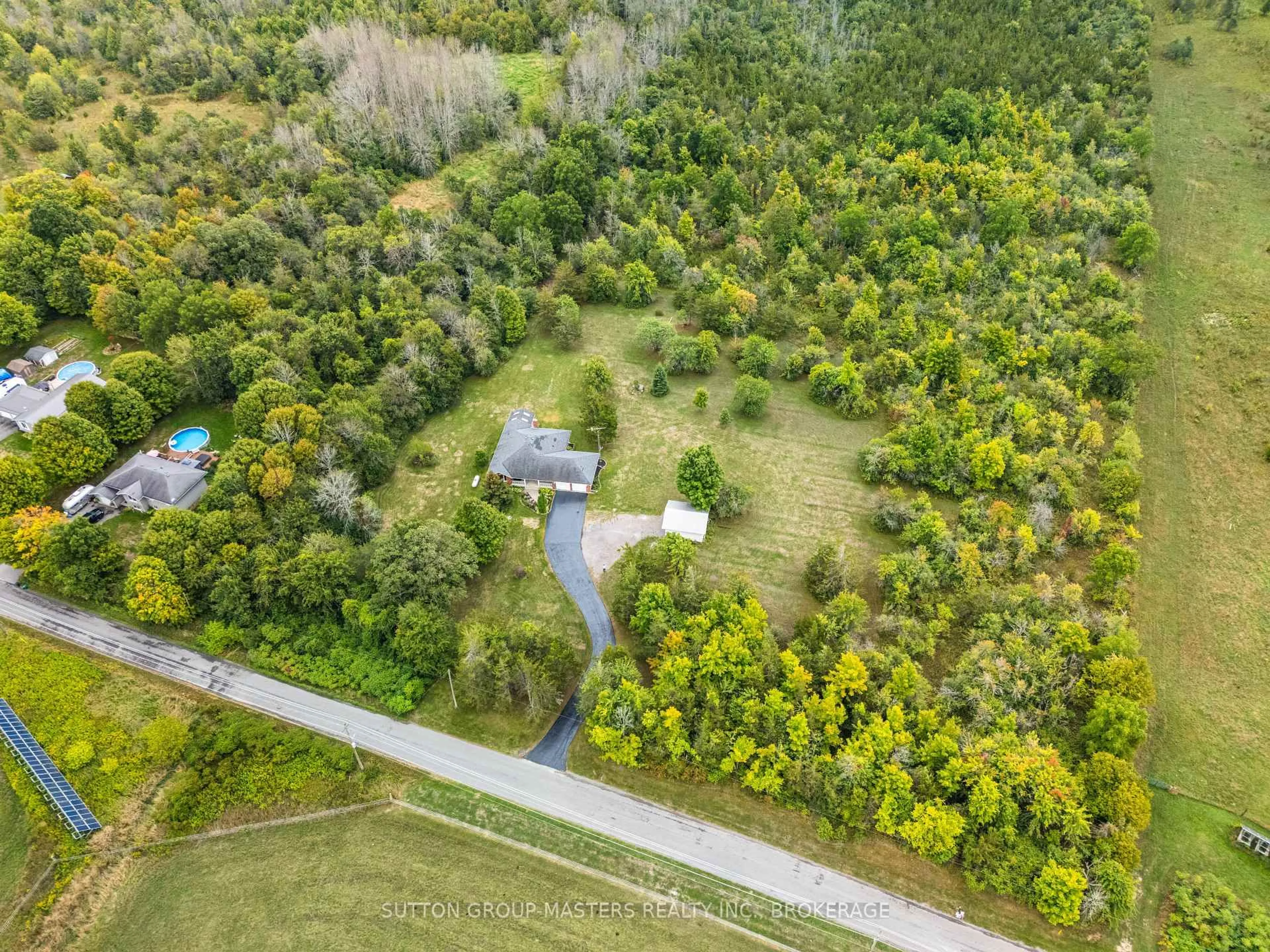 A pic from outside/outdoor area/front of a property/back of a property/a pic from drone, forest/trees view for 931 Powerline Rd, Trenton Ontario K8V 5P7