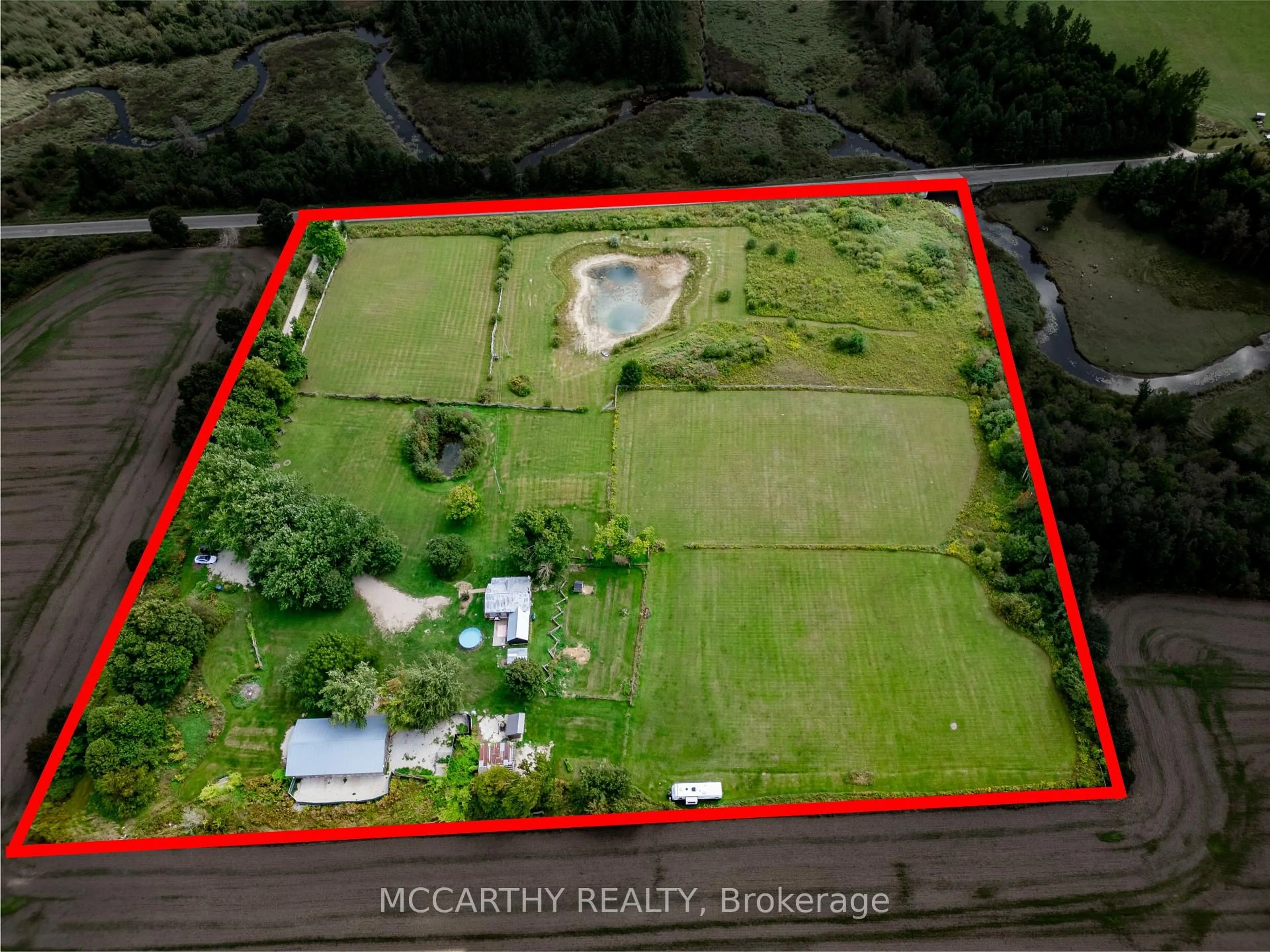 A pic from outside/outdoor area/front of a property/back of a property/a pic from drone, mountain view for 125795 Southgate Rd 12 Rd, Southgate Ontario N0C 1B0