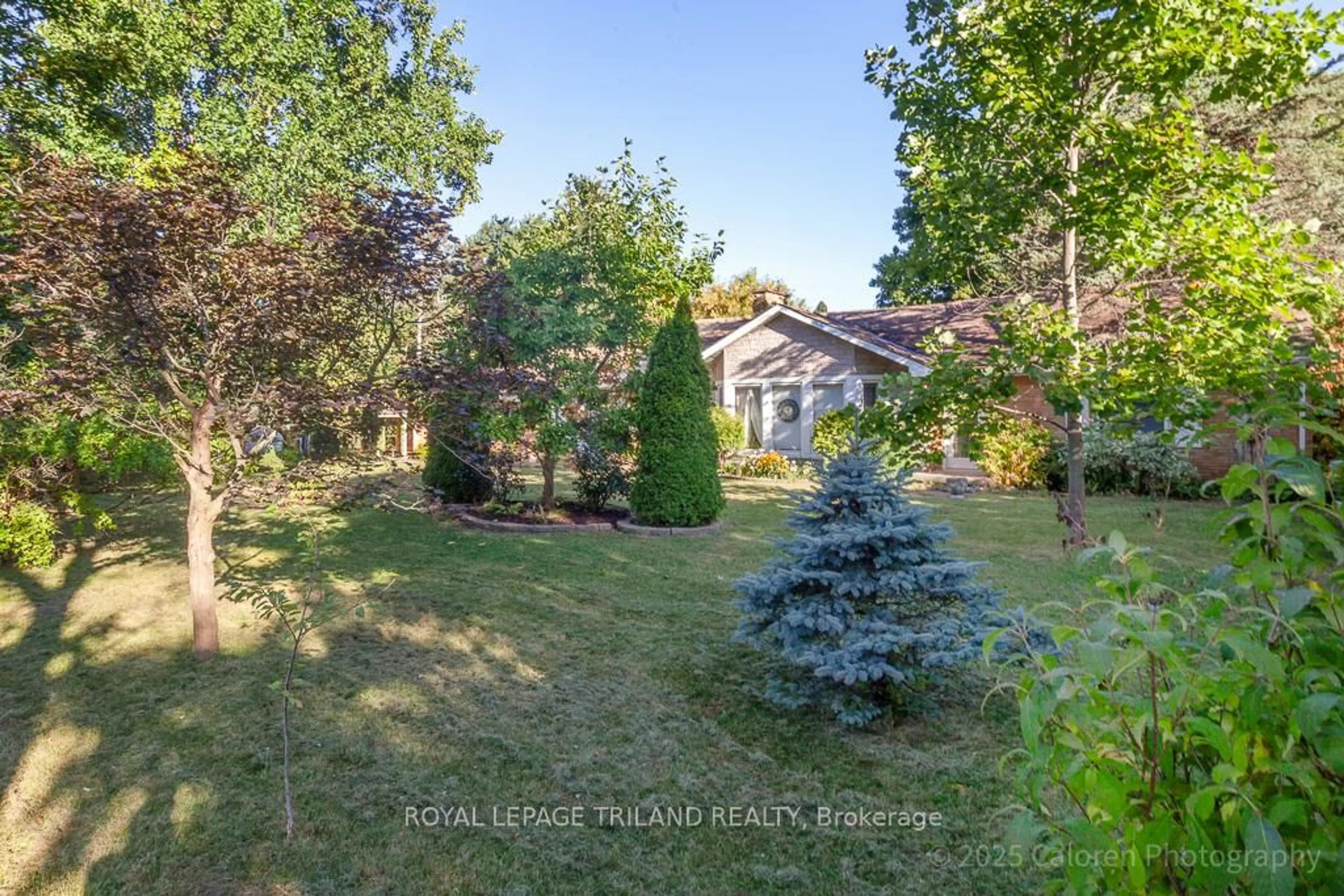 A pic from outside/outdoor area/front of a property/back of a property/a pic from drone, forest/trees view for 749 COMMISSIONERS Rd, London South Ontario N6K 1B6
