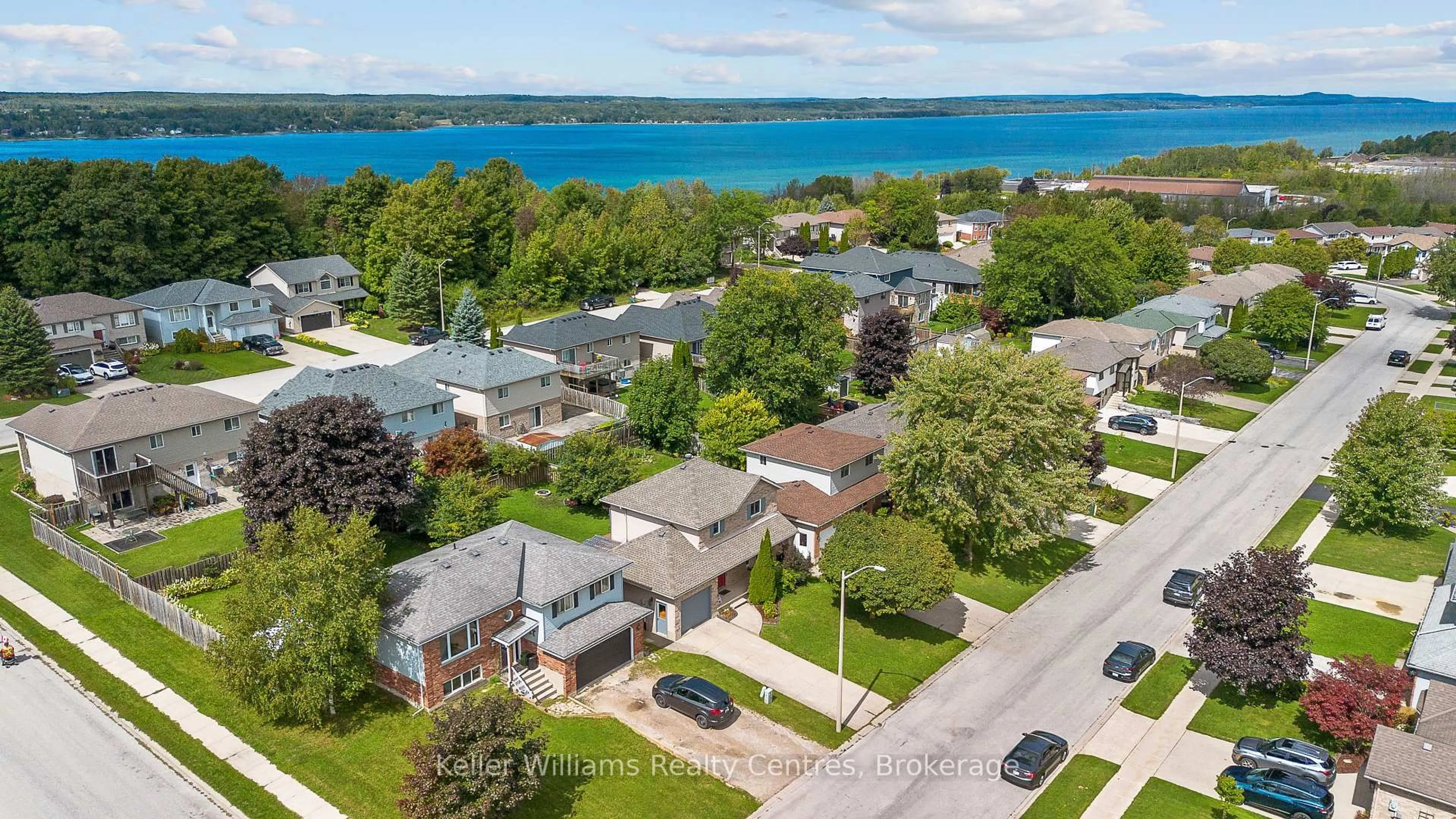 A pic from outside/outdoor area/front of a property/back of a property/a pic from drone, water/lake/river/ocean view for 2538 8th Ave, Owen Sound Ontario N4K 6V2