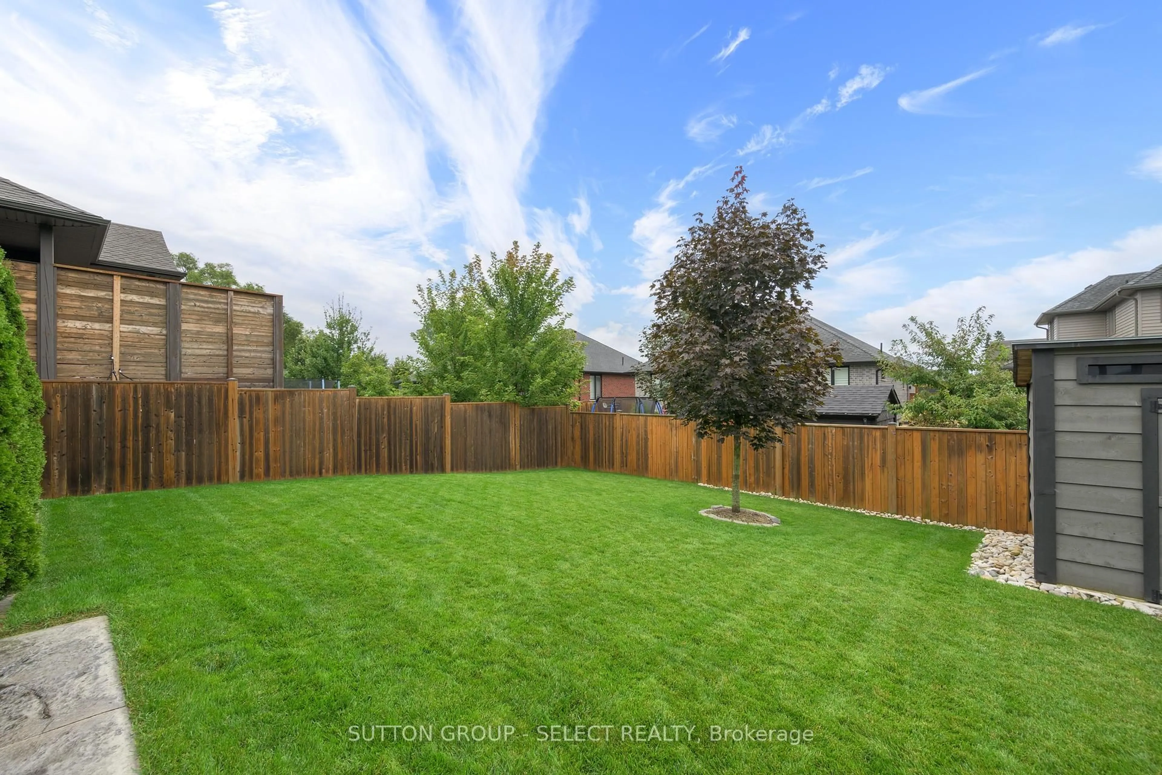 A pic from outside/outdoor area/front of a property/back of a property/a pic from drone, forest/trees view for 697 Barker St, Strathroy-Caradoc Ontario N0L 1W0