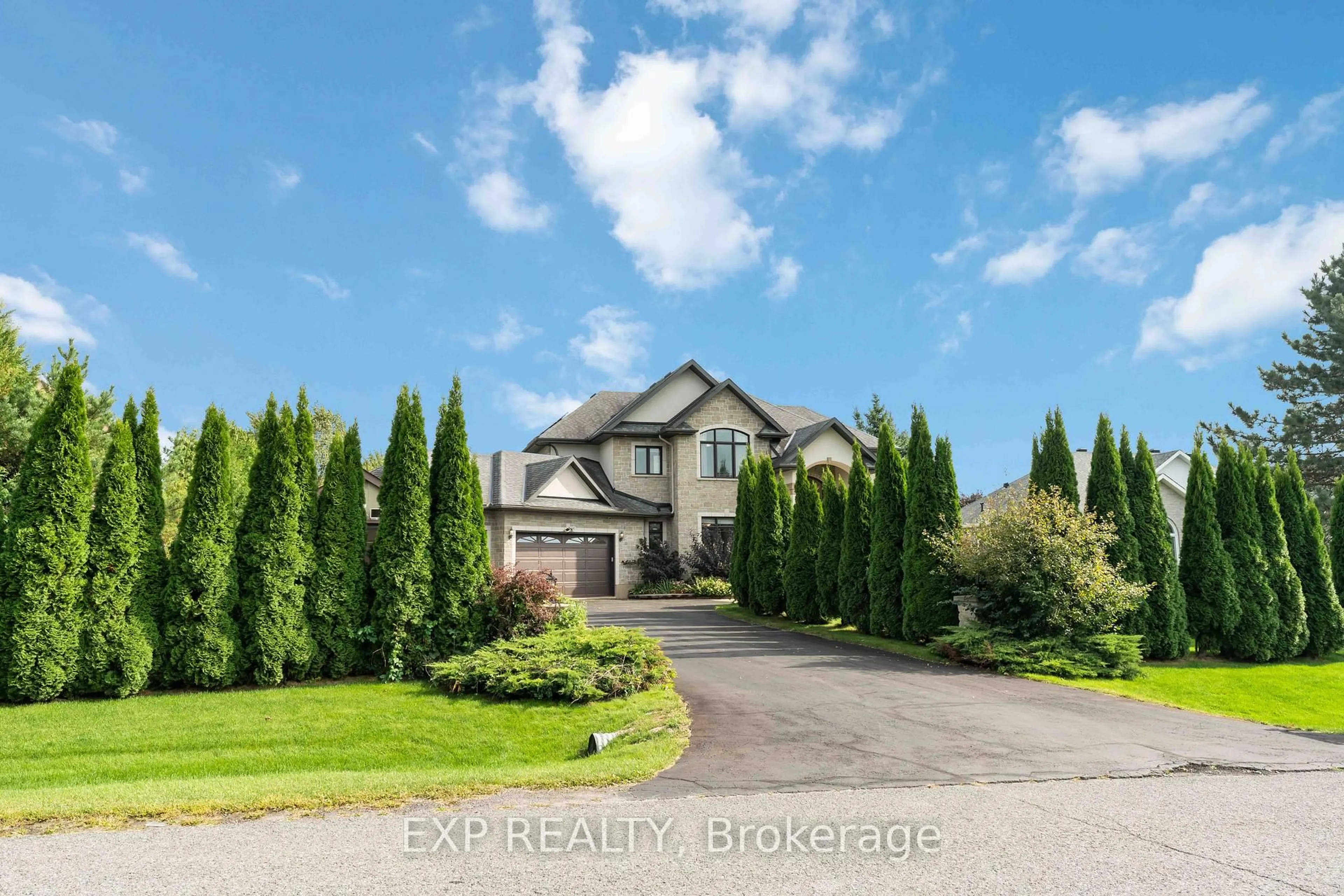 A pic from outside/outdoor area/front of a property/back of a property/a pic from drone, unknown for 6984 LAKES PARK Dr, Greely Ontario K4P 1P1